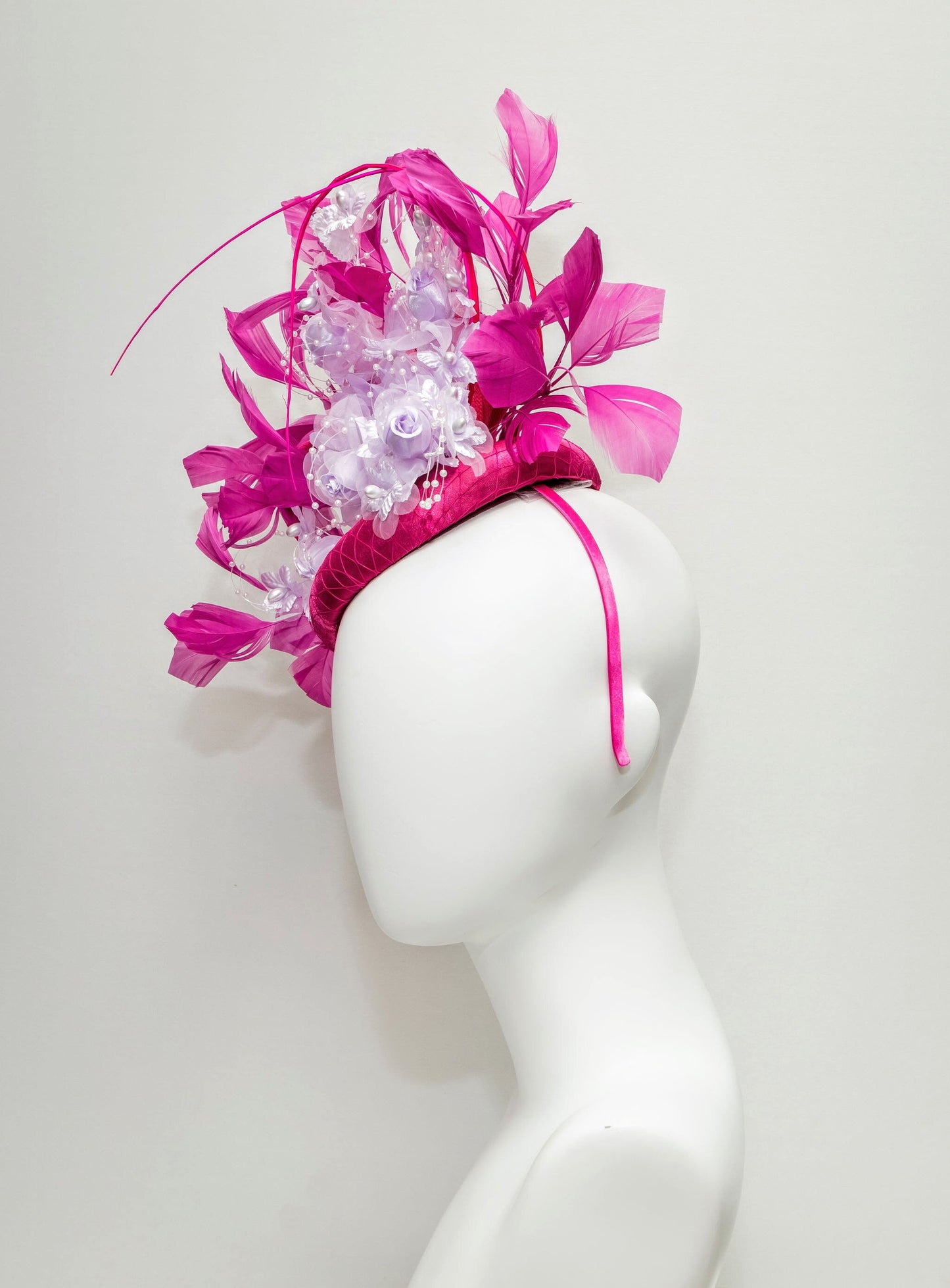 kentucky derby hat fascinator magenta fuchsia hot pink satin with bright pink feathers lavender light purple satin flowers pearls leaves