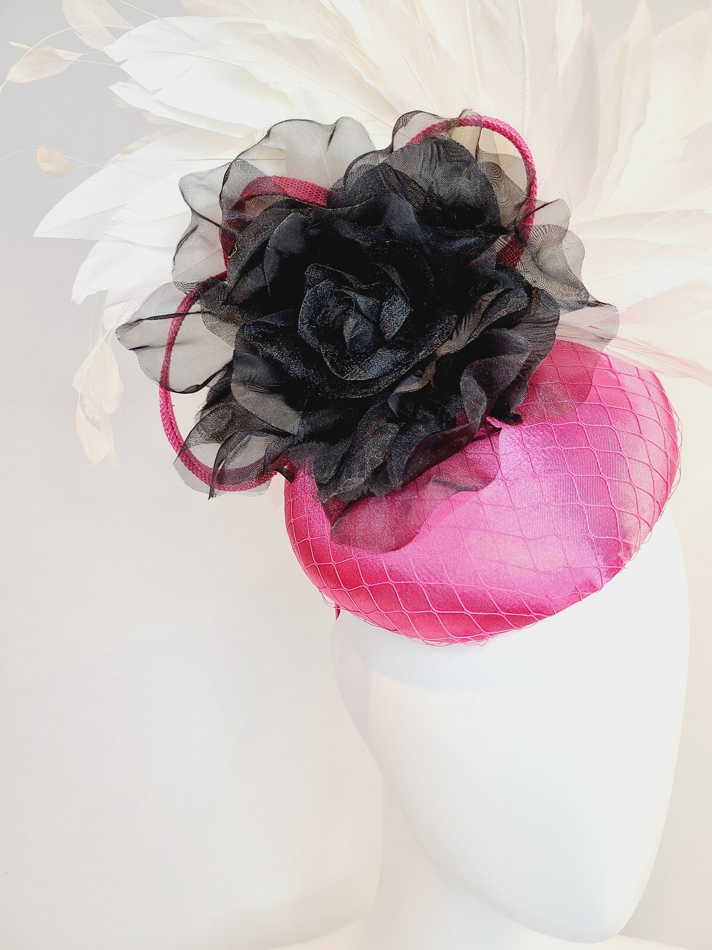 kentucky derby hat fascinator pink fuchsia satin with gorgeous black organza velvet flower rose and white feathers