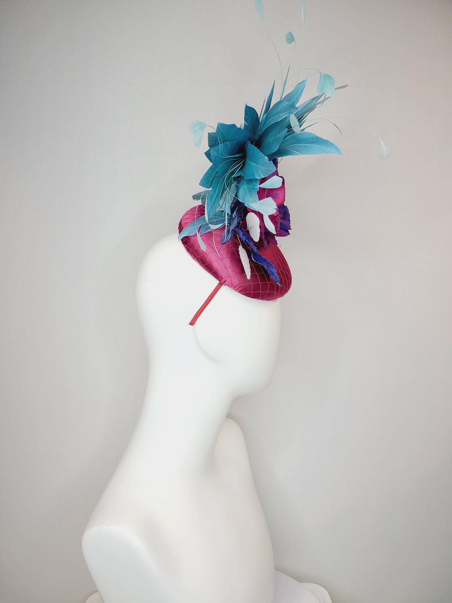 kentucky derby hat fascinator fuchsia magenta satin with painted magenta blue rose with teal blue feathers light blue royal blue leaves