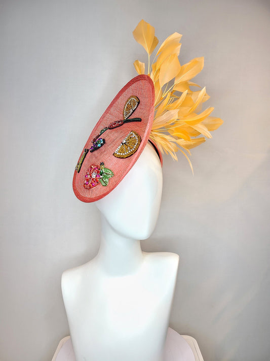 kentucky derby hat fascinator coral sinamay saucer with orange feathers with crystal rhinestone fruit grapes cherry lemon