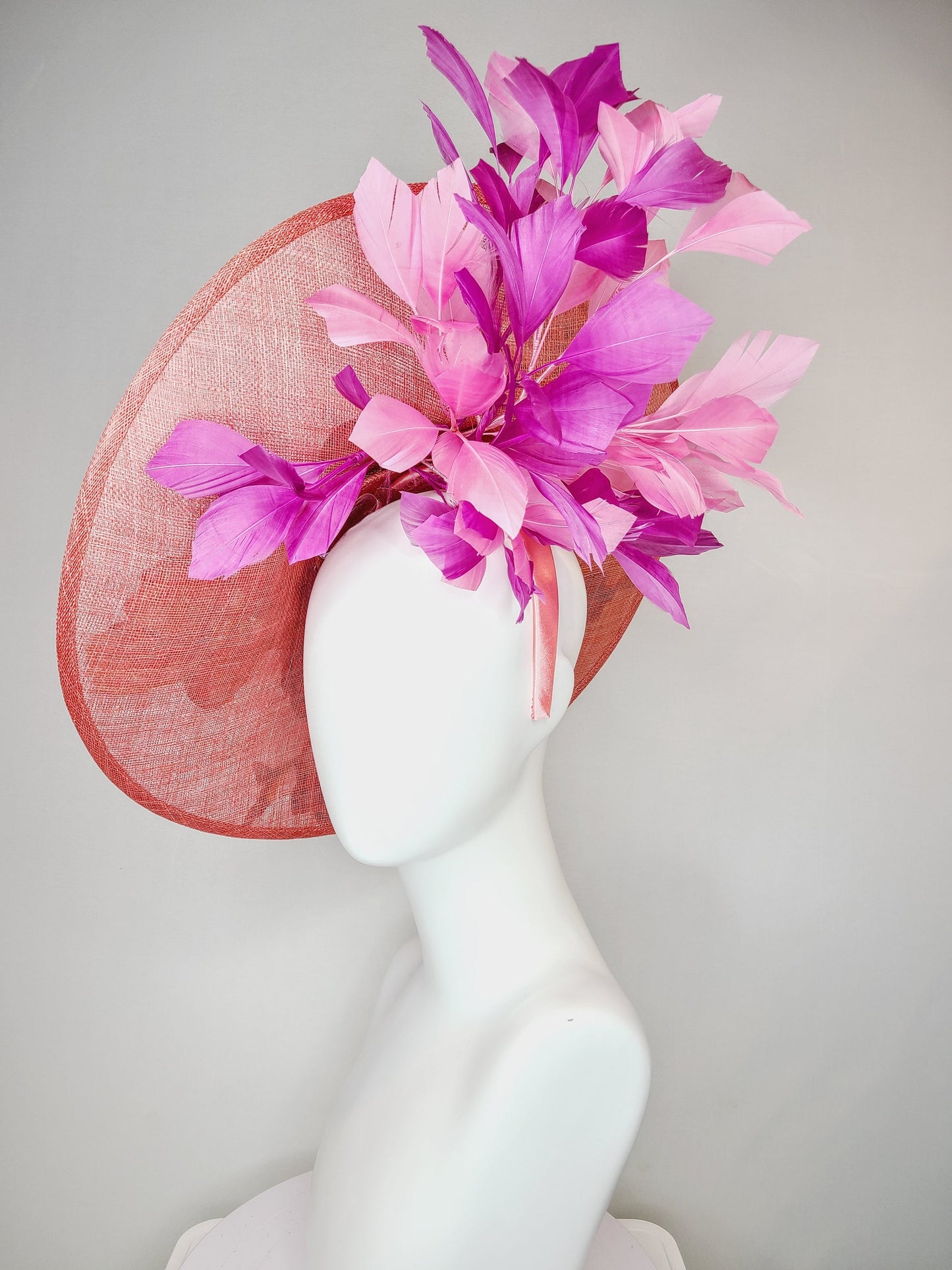 kentucky derby hat fascinator coral pink peach sinamay saucer fascinator with embroidered pink purple gold flowers with pink purple feathers