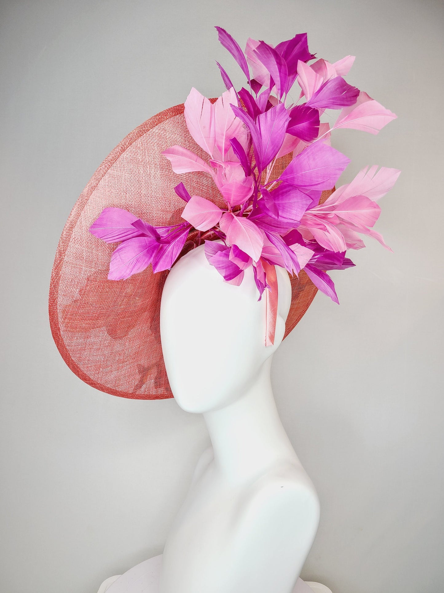 kentucky derby hat fascinator coral pink peach sinamay saucer fascinator with embroidered pink purple gold flowers with pink purple feathers