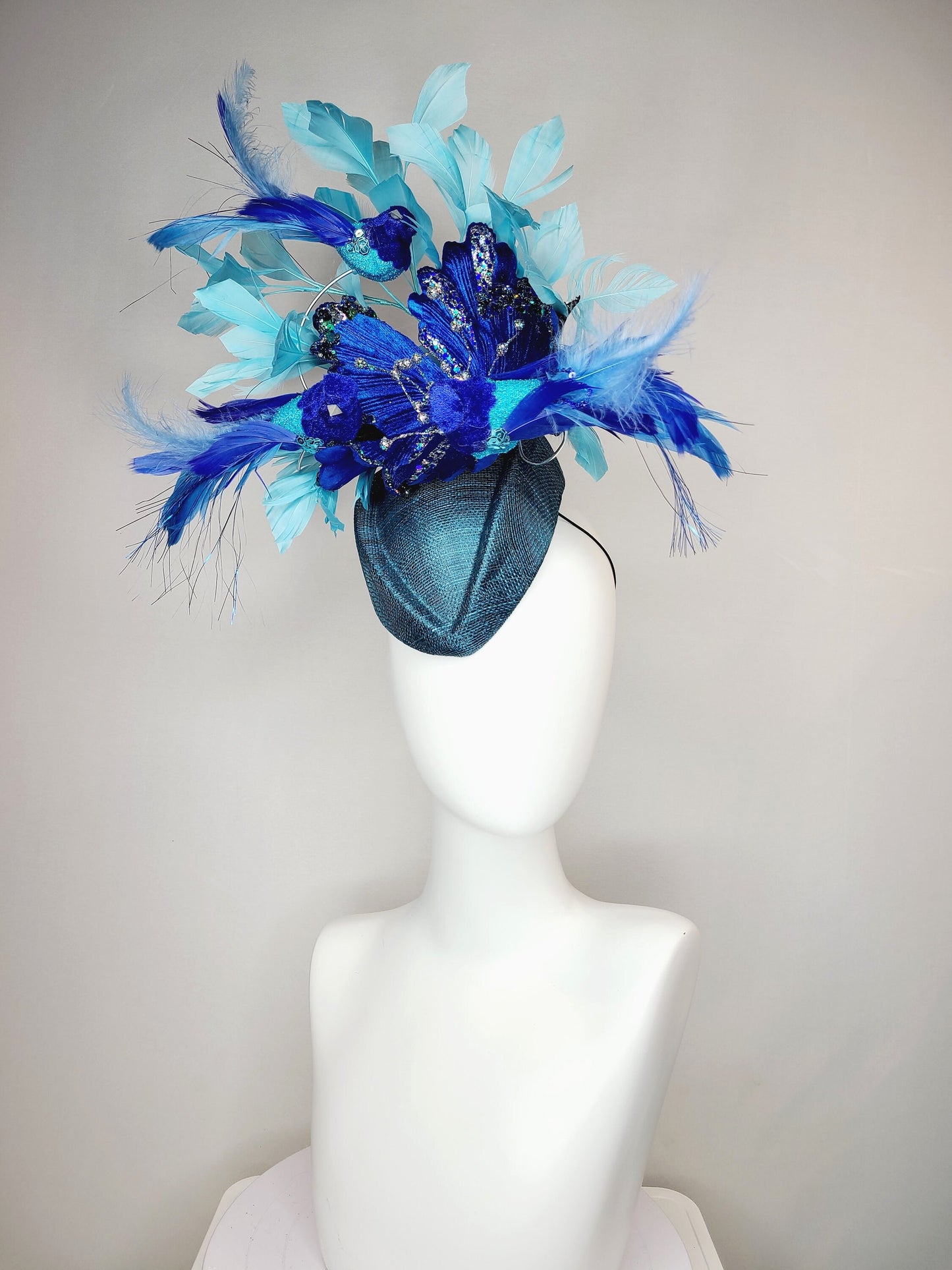 kentucky derby hat fascinator teal blue cocktail hat with royal blue  flying feather 2 birds velvet glitter flower light  blue feathers