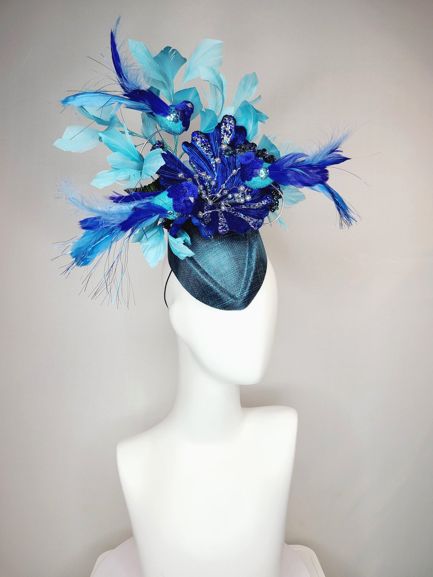 kentucky derby hat fascinator teal blue cocktail hat with royal blue  flying feather 2 birds velvet glitter flower light  blue feathers