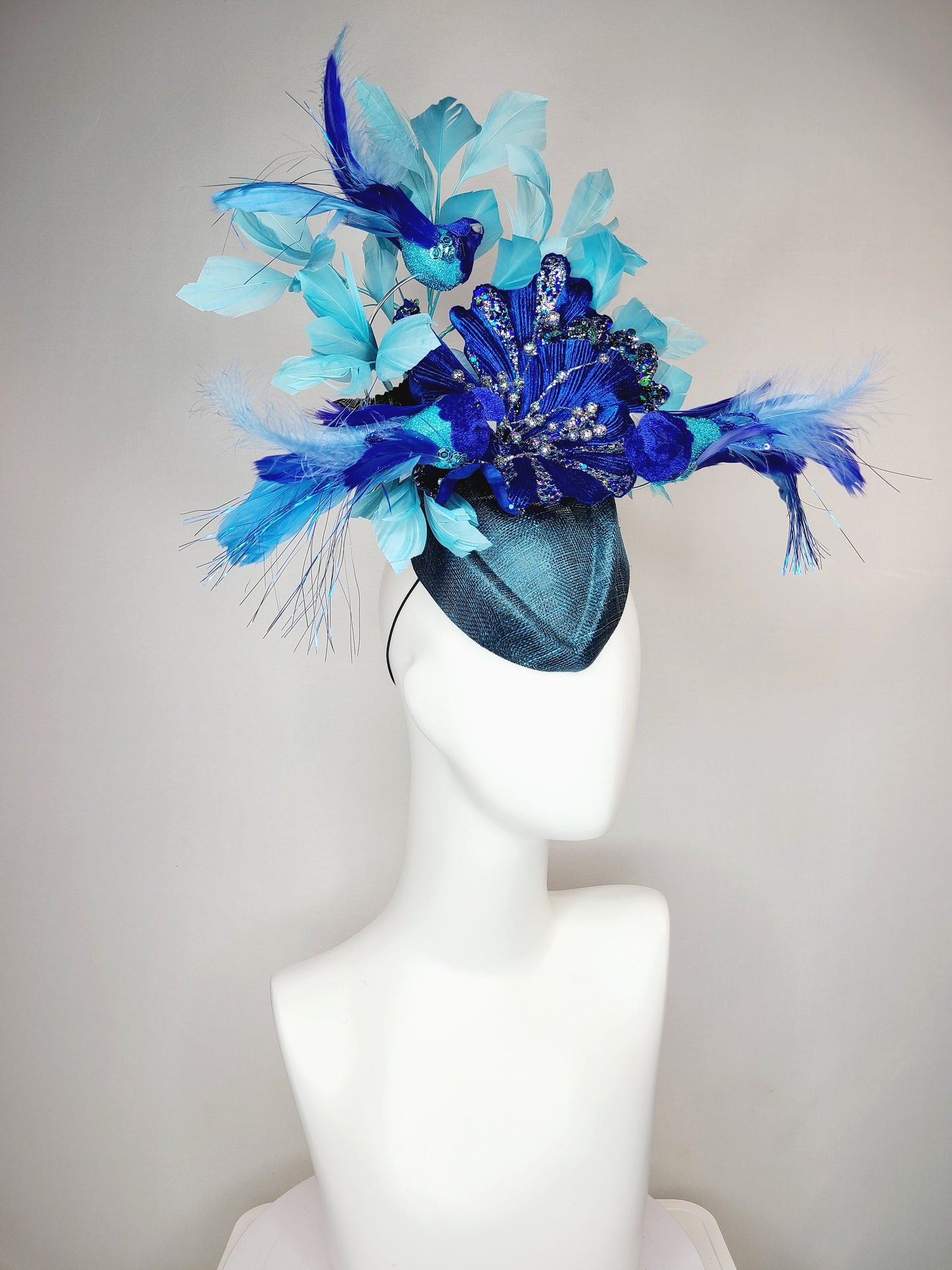 kentucky derby hat fascinator teal blue cocktail hat with royal blue  flying feather 2 birds velvet glitter flower light  blue feathers