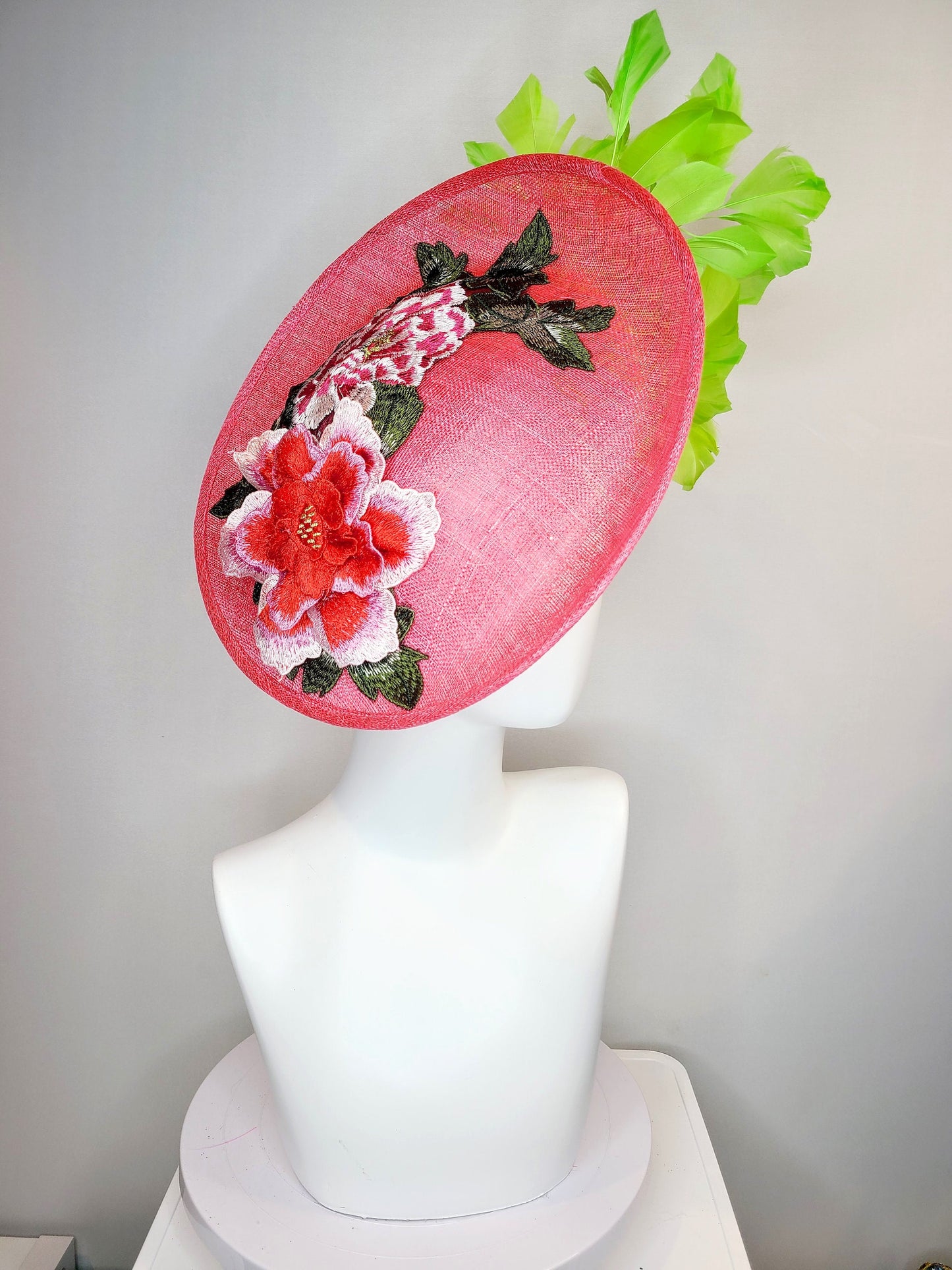 kentucky derby hat fascinator coral orange sinamay fascinator with pink fuchsia green embroidered flowers green feathers