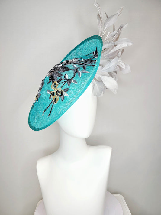 kentucky derby hat fascinator teal blue green sinamay saucer with silver gray black embroidered flowers with silver gray feathers