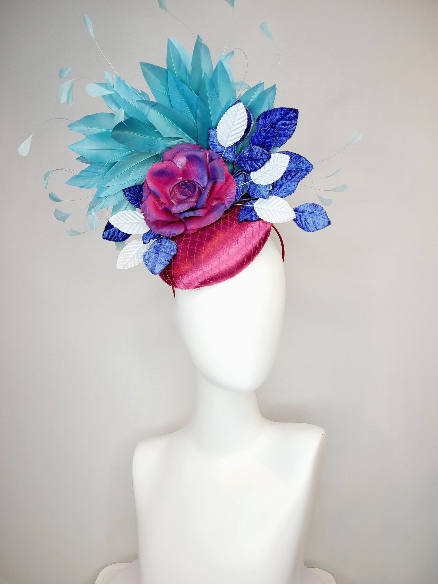 kentucky derby hat fascinator fuchsia magenta satin with painted magenta blue rose with teal blue feathers light blue royal blue leaves