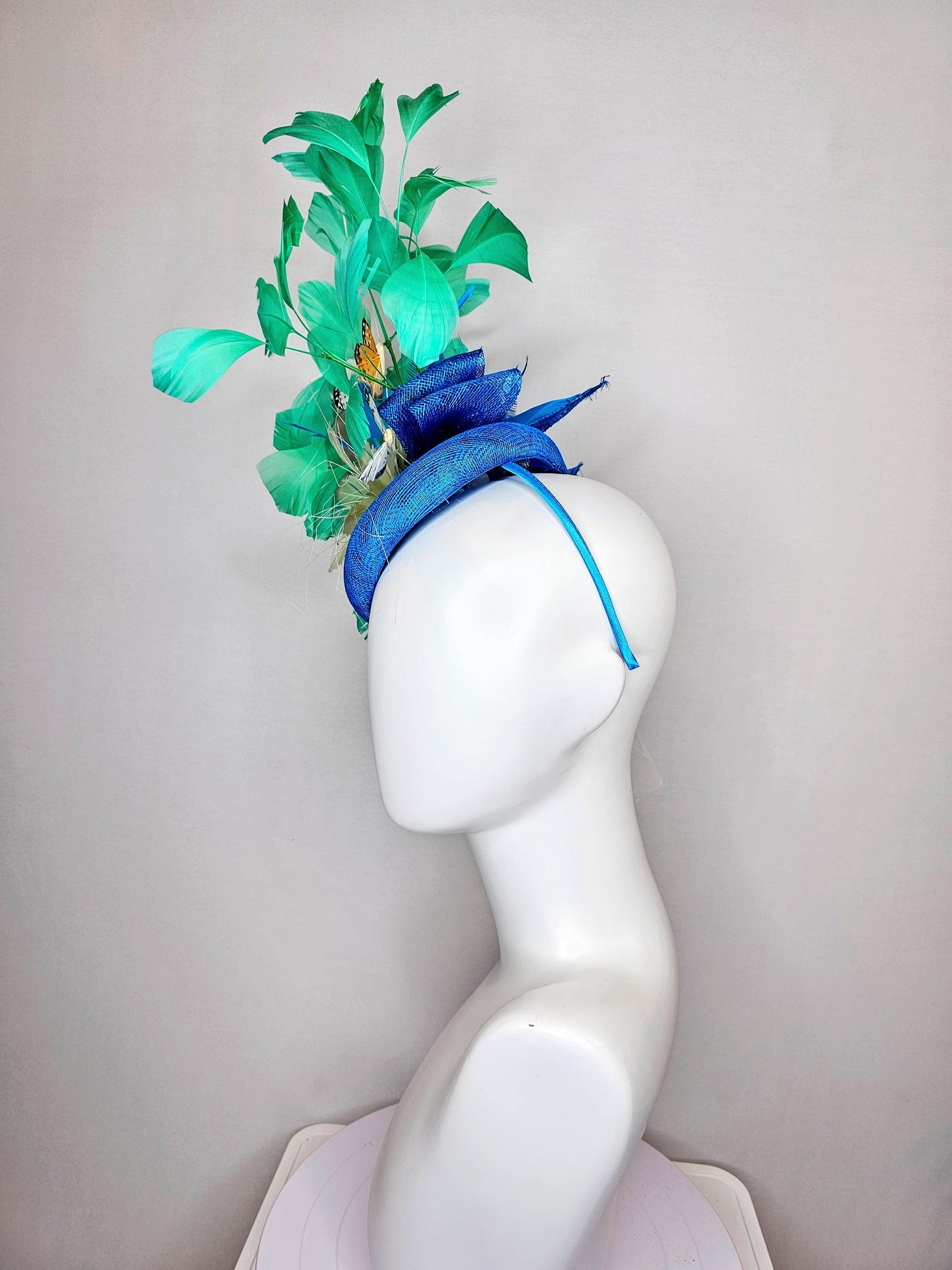 kentucky derby hat fascinator blue turquoise sinamay light green feather flower  green feathers and white orange coral black butterflies