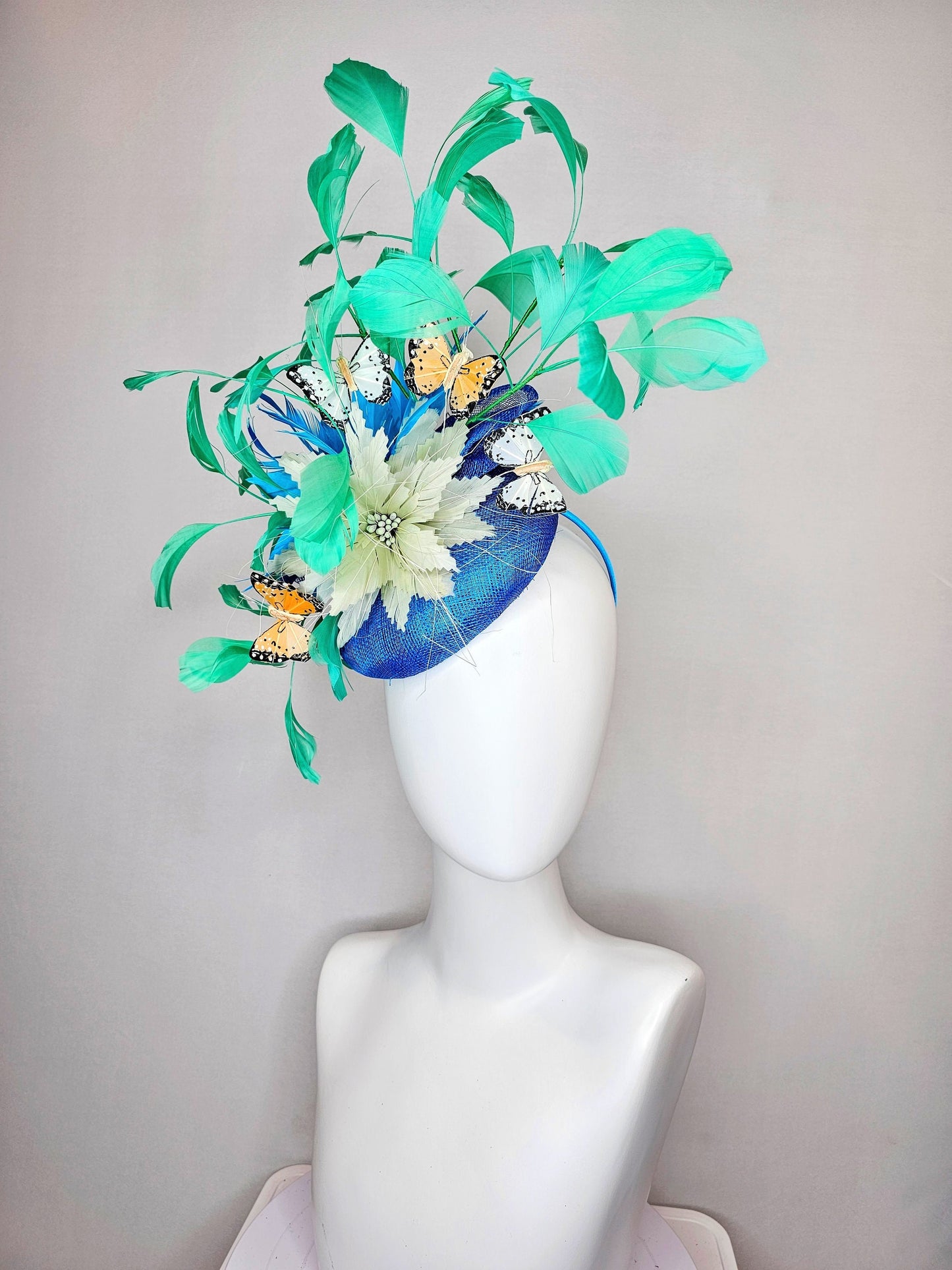 kentucky derby hat fascinator blue turquoise sinamay light green feather flower  green feathers and white orange coral black butterflies