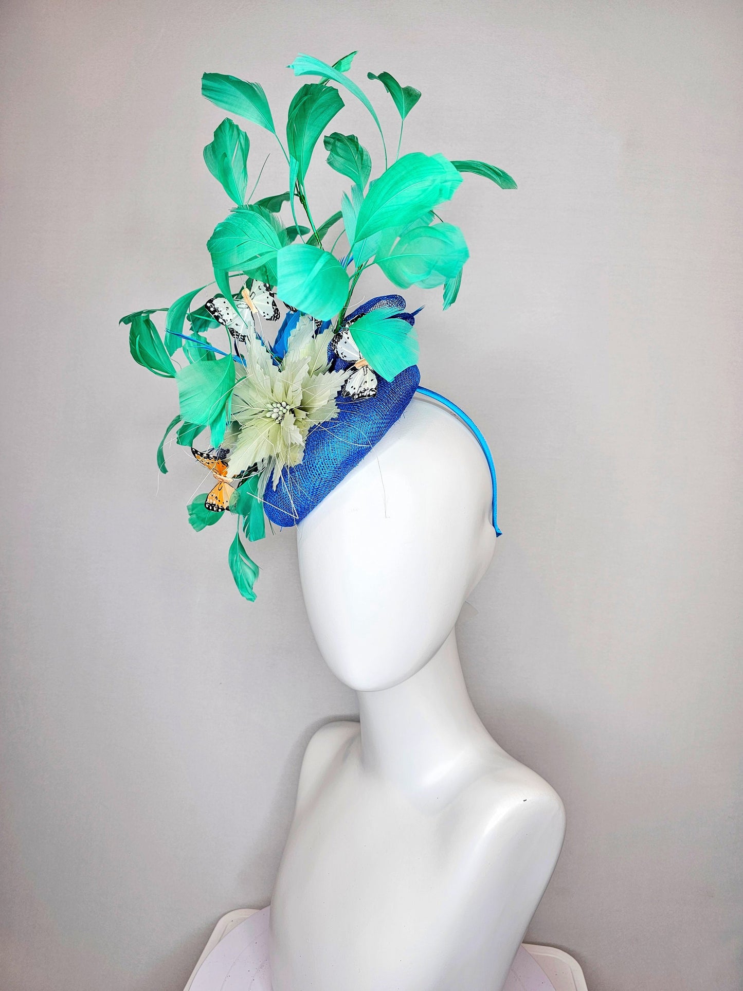 kentucky derby hat fascinator blue turquoise sinamay light green feather flower  green feathers and white orange coral black butterflies