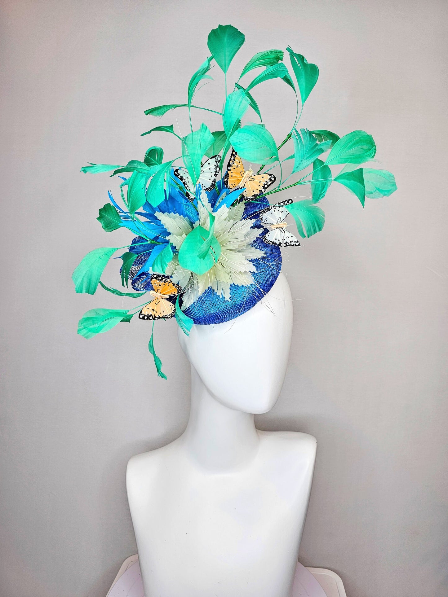 kentucky derby hat fascinator blue turquoise sinamay light green feather flower  green feathers and white orange coral black butterflies