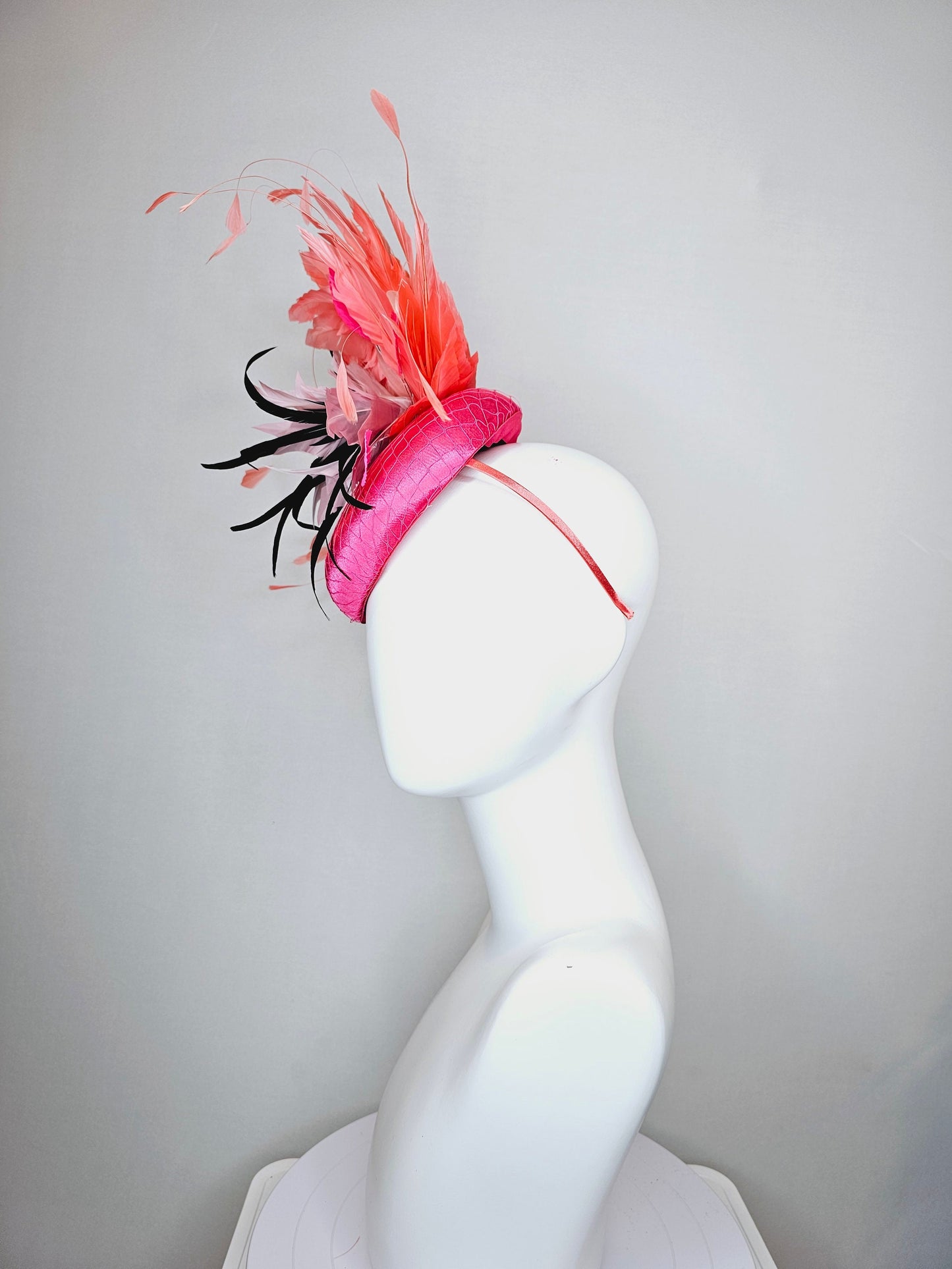 kentucky derby hat fascinator bright pink satin fascinator with light pink and black feather flower coral orange feathers