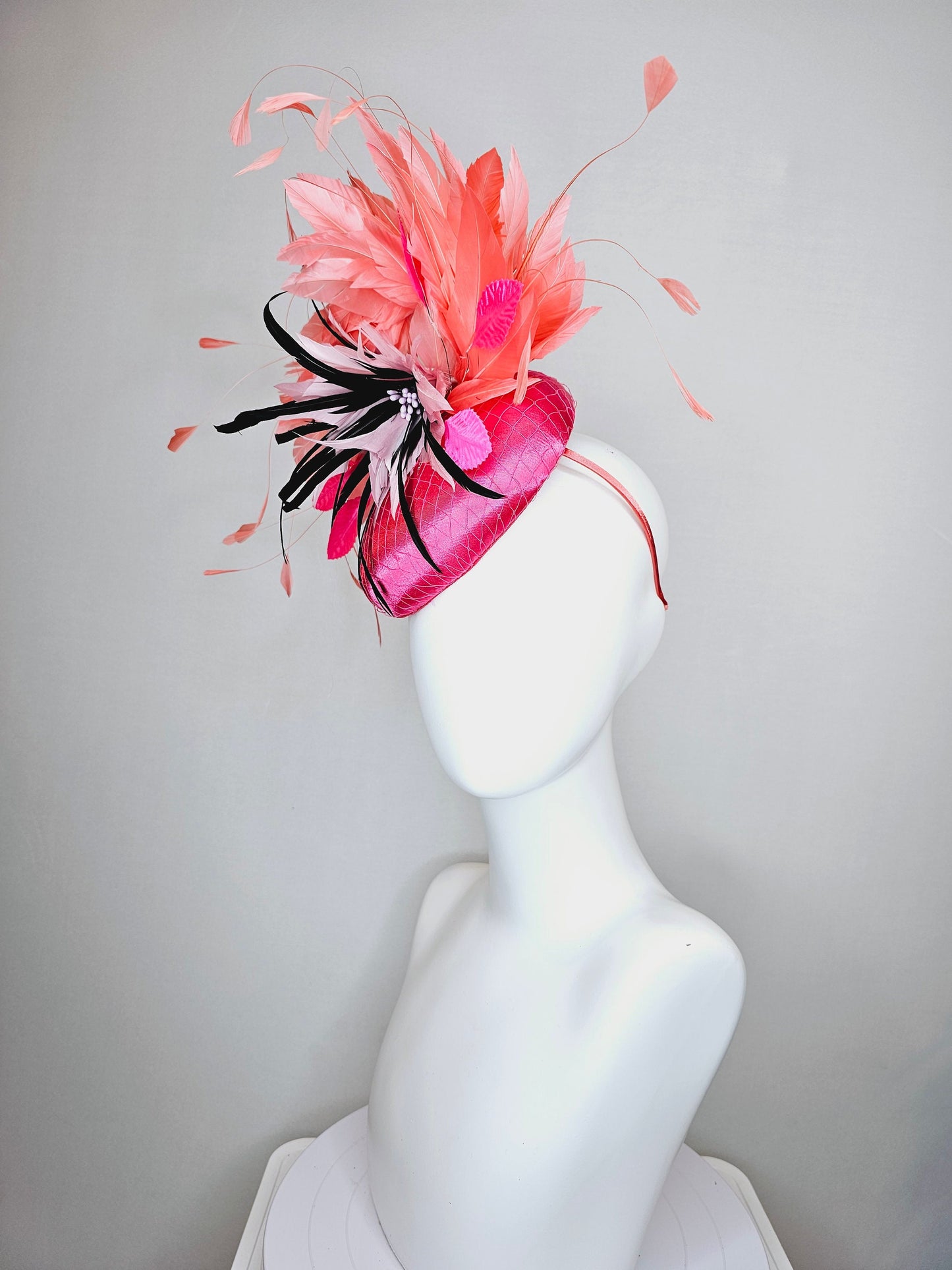 kentucky derby hat fascinator bright pink satin fascinator with light pink and black feather flower coral orange feathers