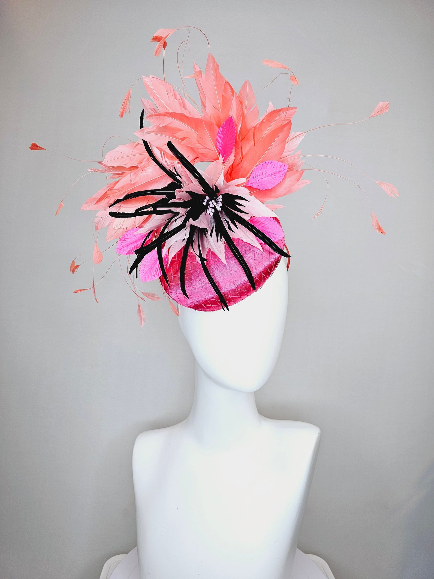 kentucky derby hat fascinator bright pink satin fascinator with light pink and black feather flower coral orange feathers