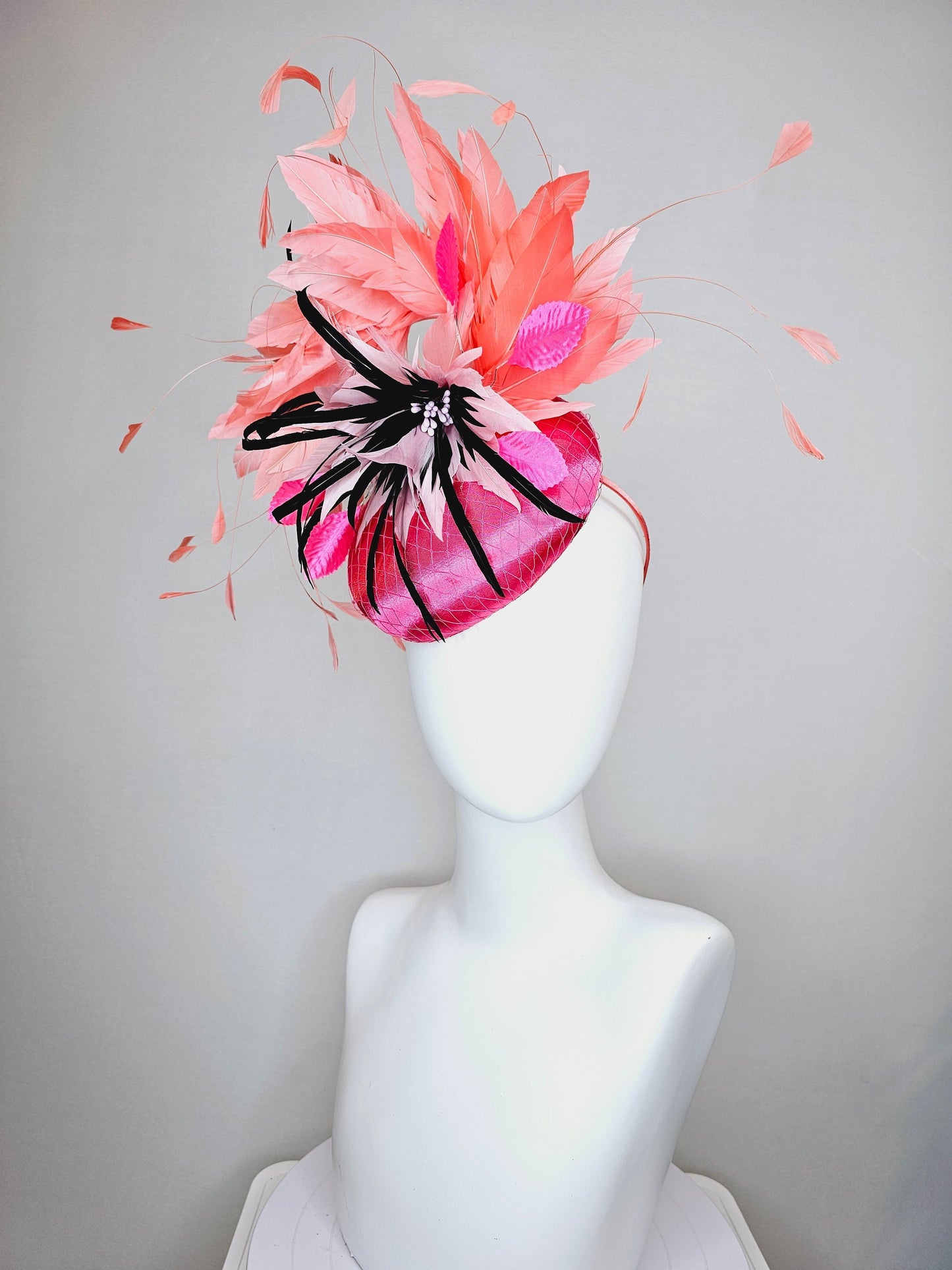 kentucky derby hat fascinator bright pink satin fascinator with light pink and black feather flower coral orange feathers