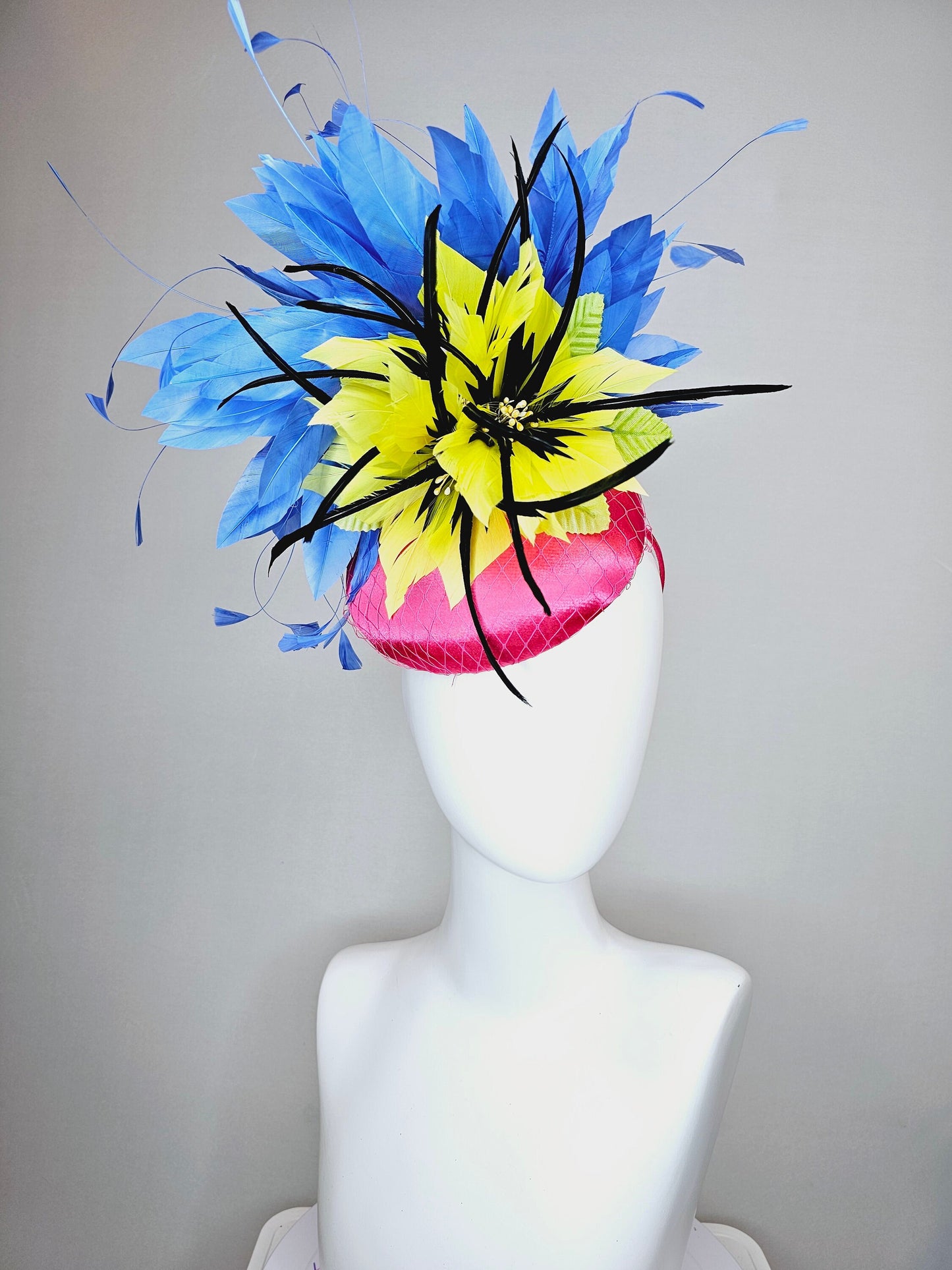 kentucky derby hat fascinator bright pink fuchsia satin with yellow and black feather flowers and periwinkle blue feathers