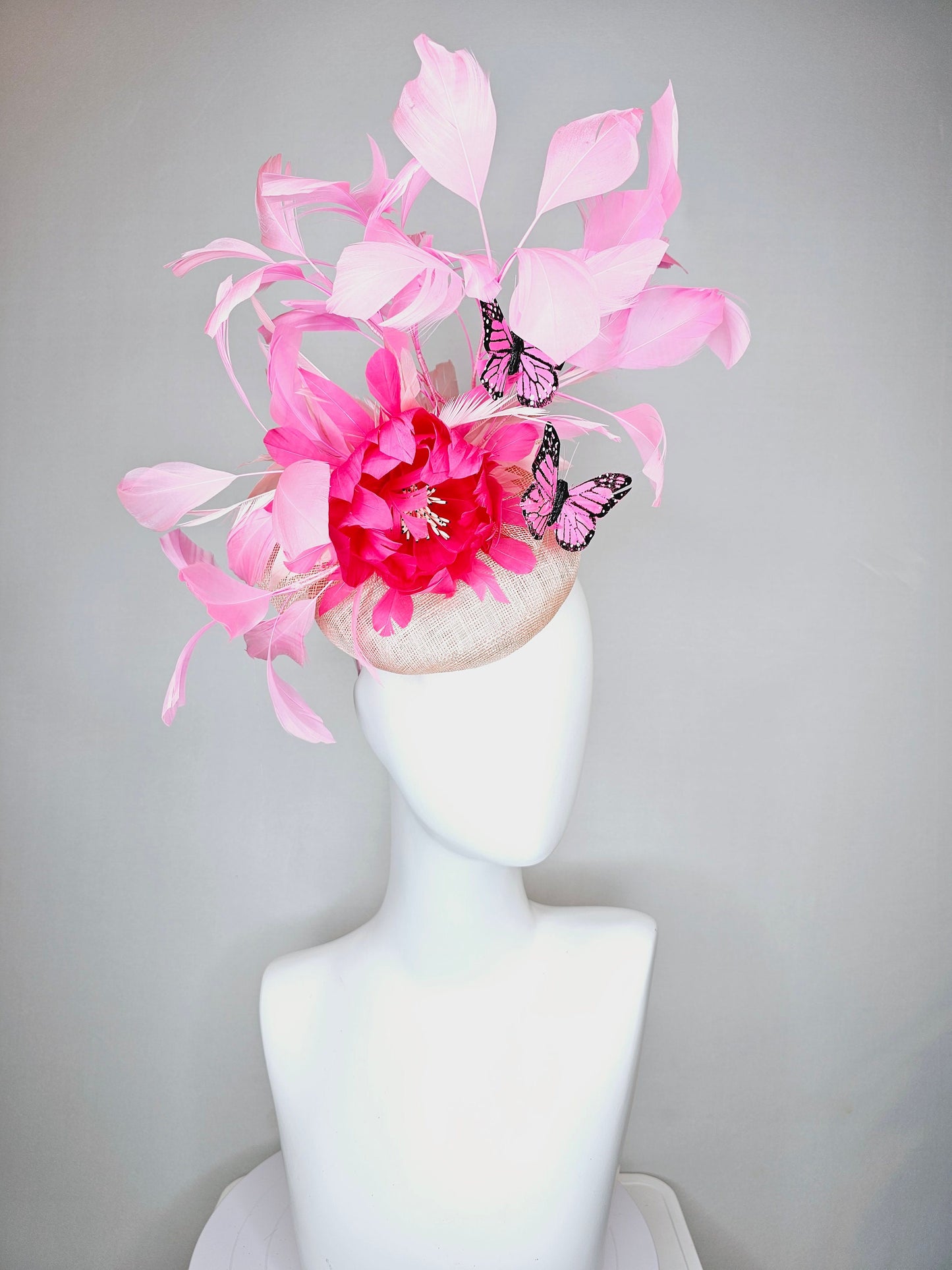 kentucky derby hat fascinator blush light pink sinamay with bright pink feather flower with pink feathers and pink butterflies