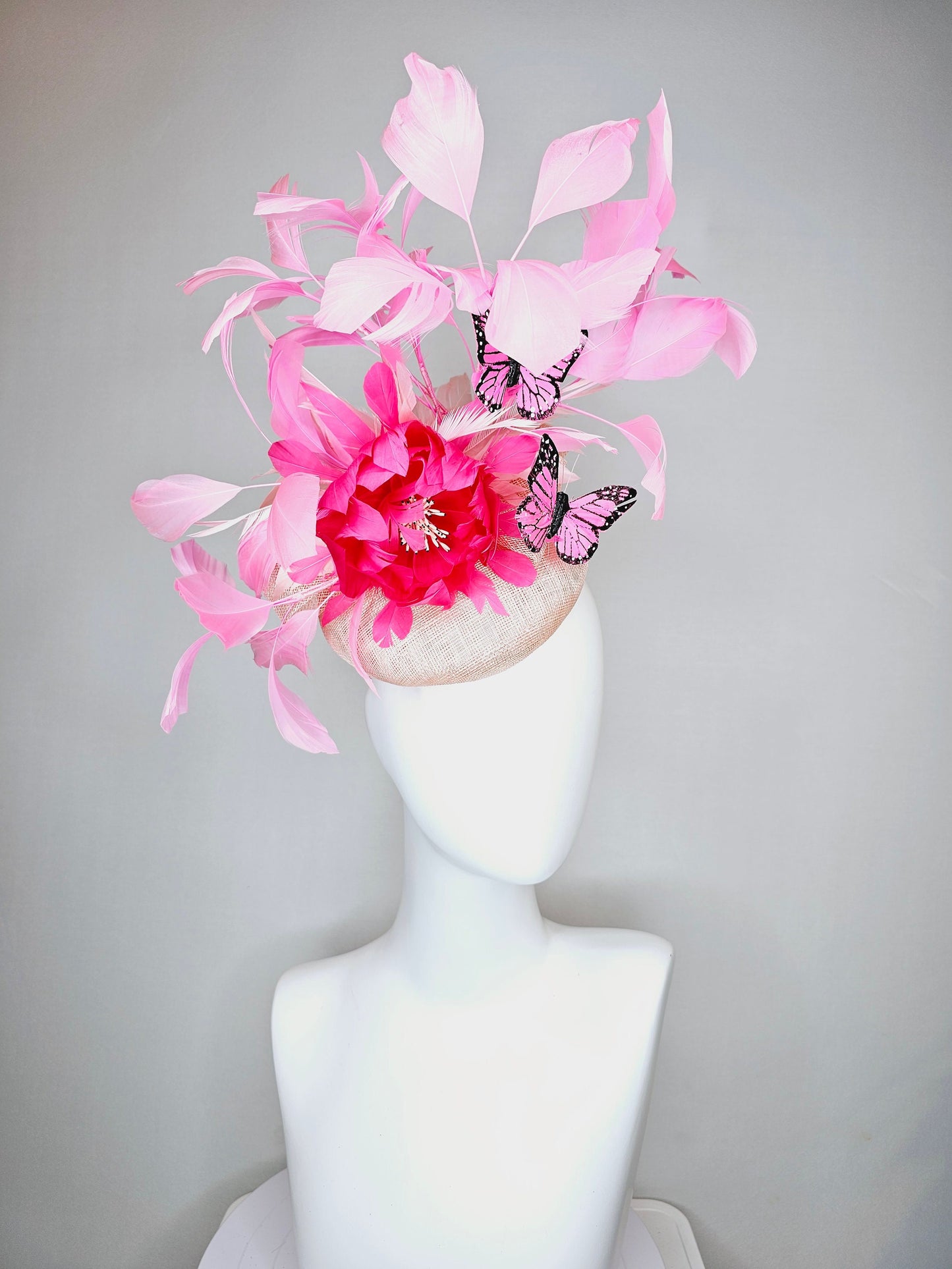 kentucky derby hat fascinator blush light pink sinamay with bright pink feather flower with pink feathers and pink butterflies