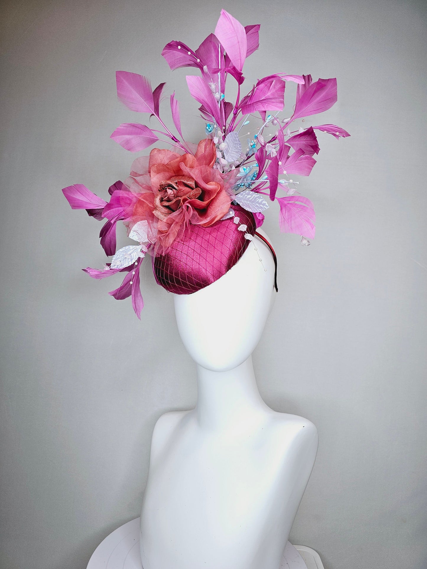 kentucky derby hat fascinator purple pink magenta satin with large burnt orange rust flower with purple lavender feathers light satin leaves