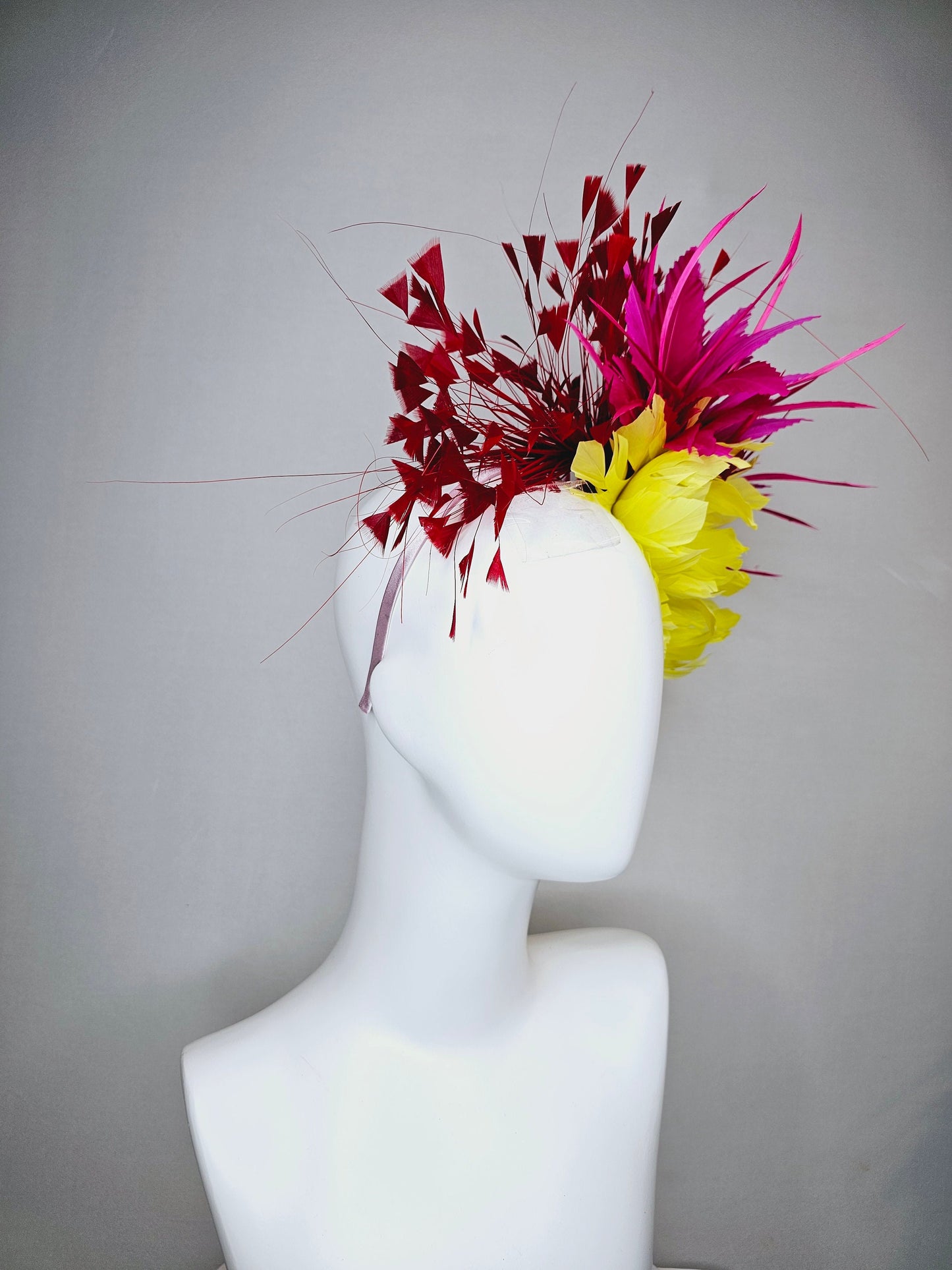 kentucky derby hat fascinator large yellow feather flowers with bright pink and red feathers thin headband