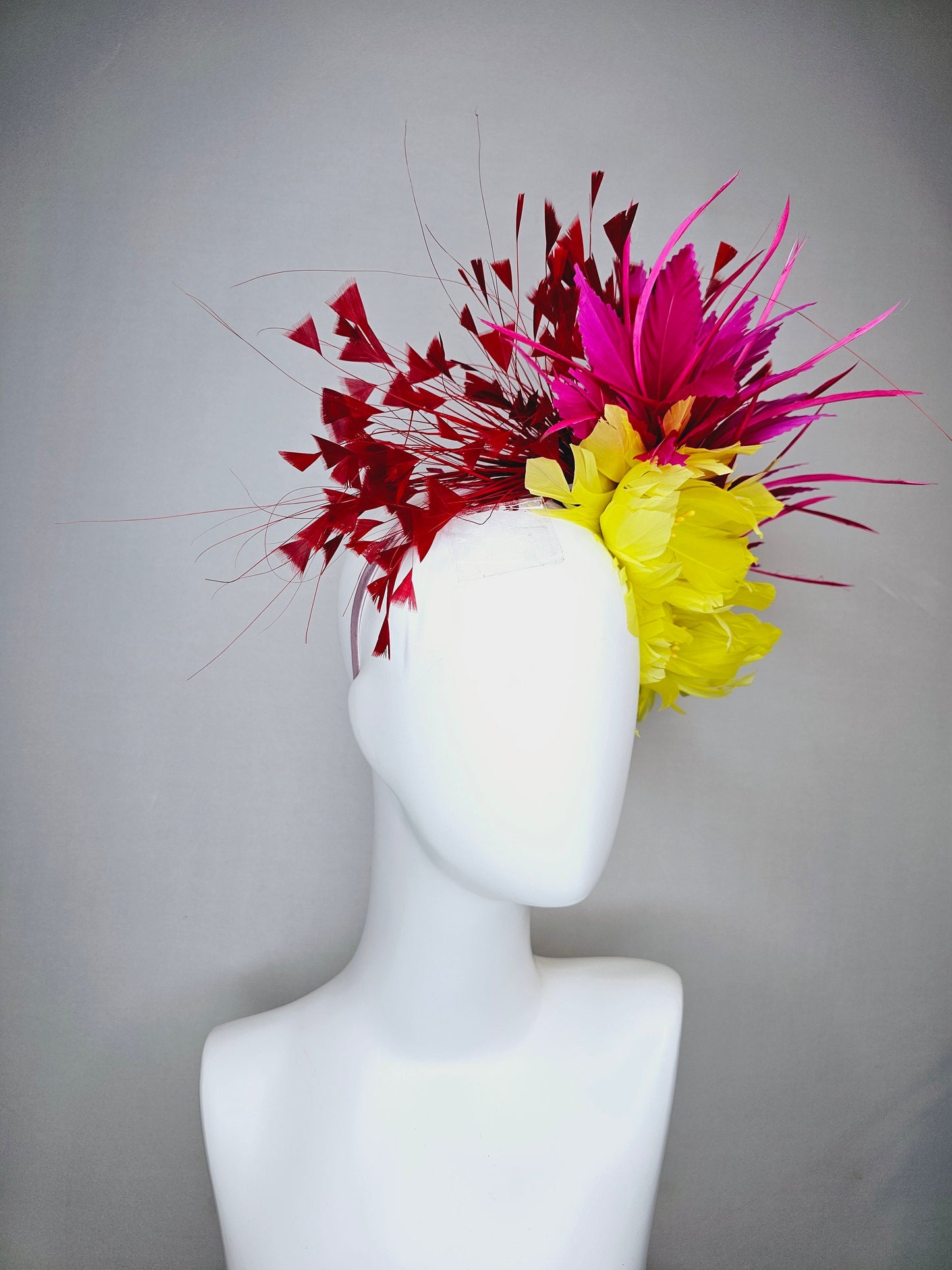 kentucky derby hat fascinator large yellow feather flowers with bright pink and red feathers thin headband