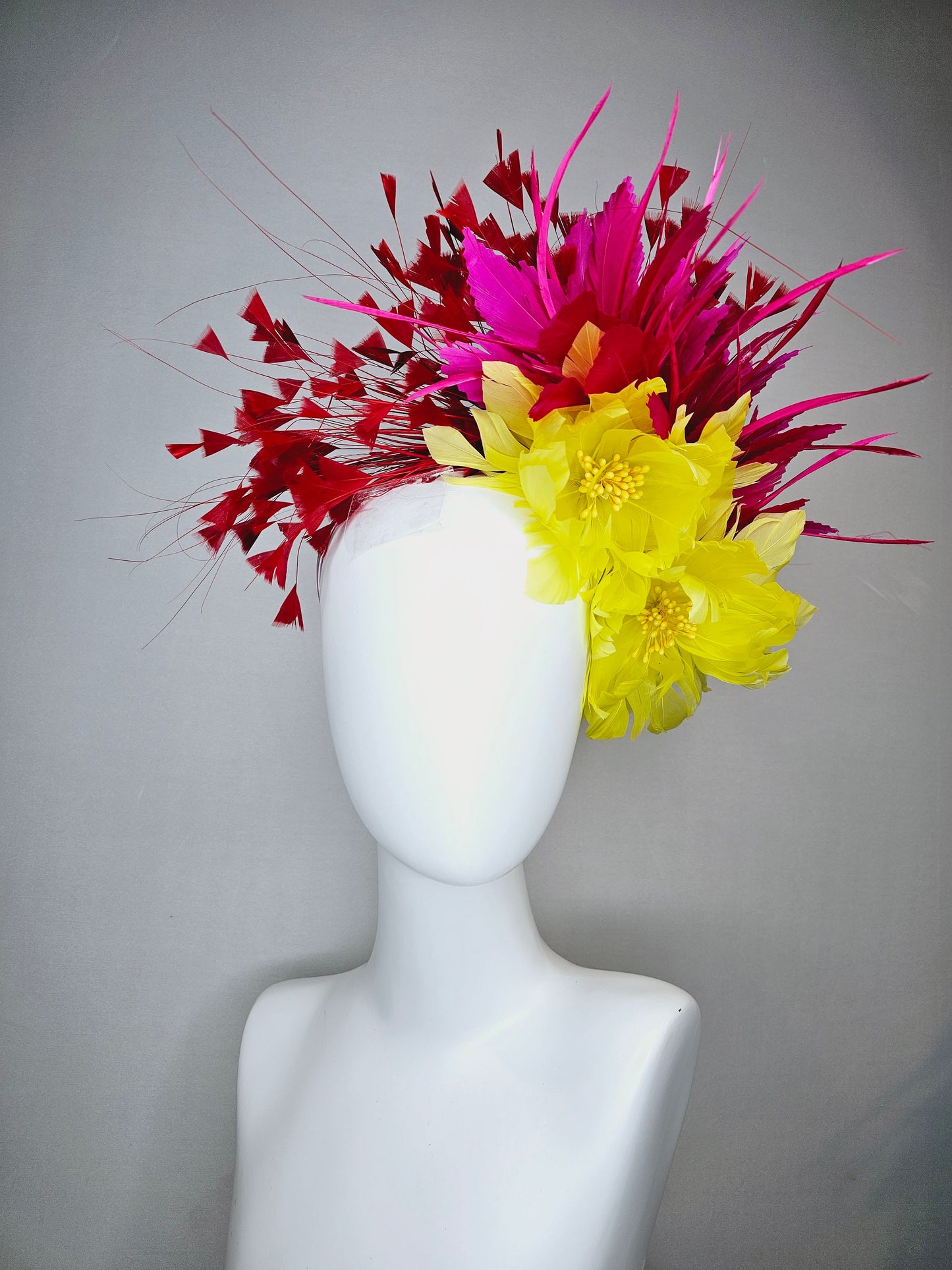 kentucky derby hat fascinator large yellow feather flowers with bright pink and red feathers thin headband