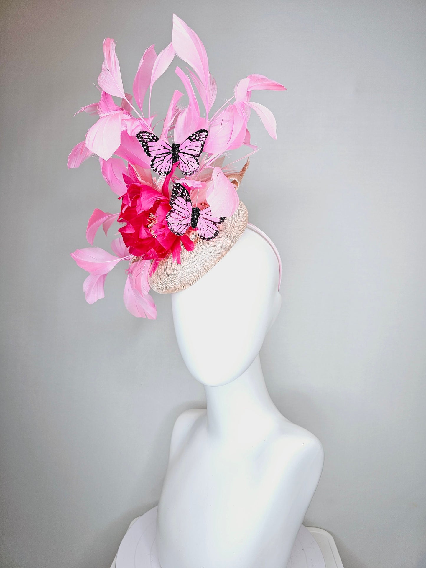 kentucky derby hat fascinator blush light pink sinamay with bright pink feather flower with pink feathers and pink butterflies