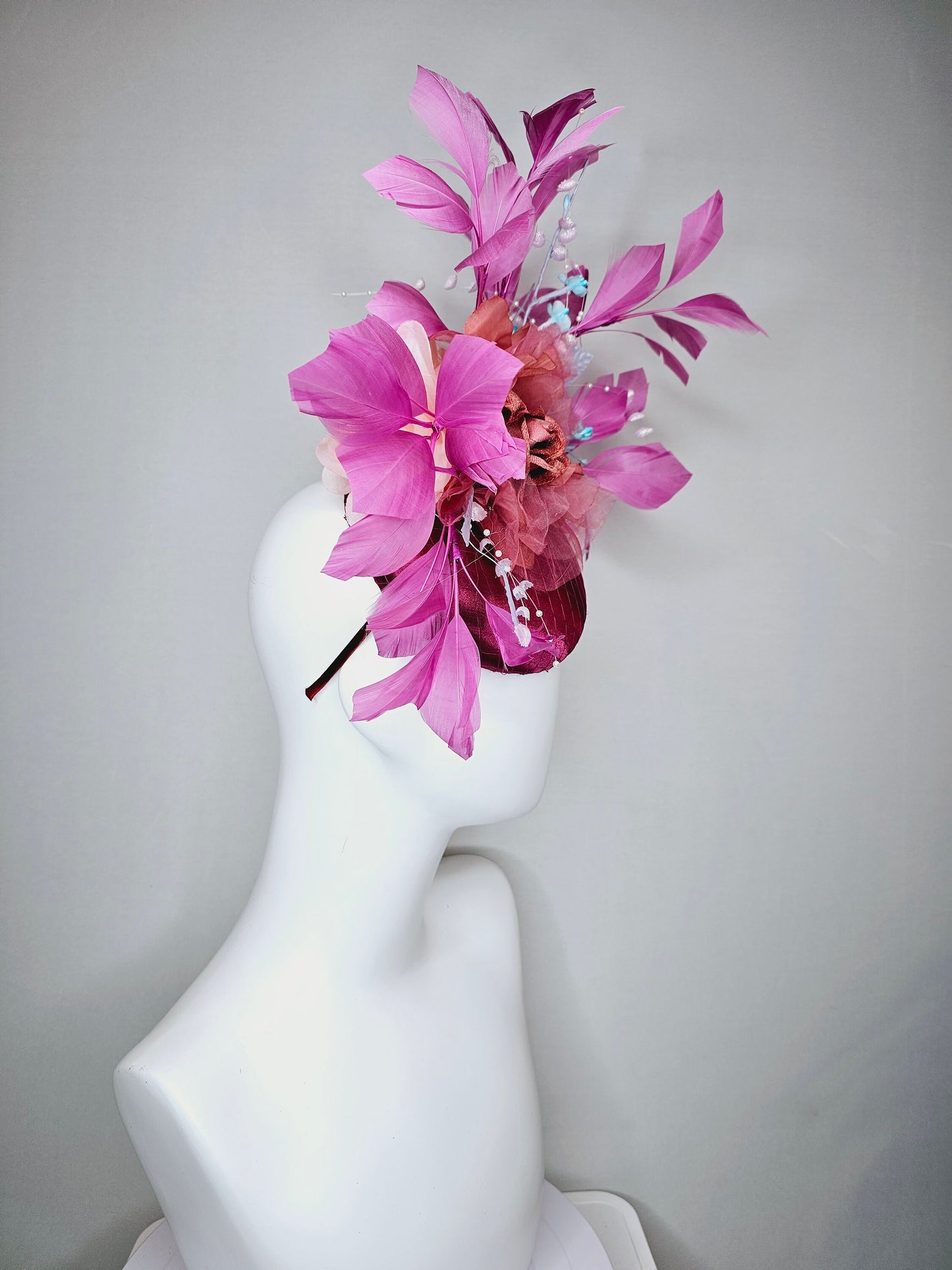 kentucky derby hat fascinator purple pink magenta satin with large burnt orange rust flower with purple lavender feathers light satin leaves