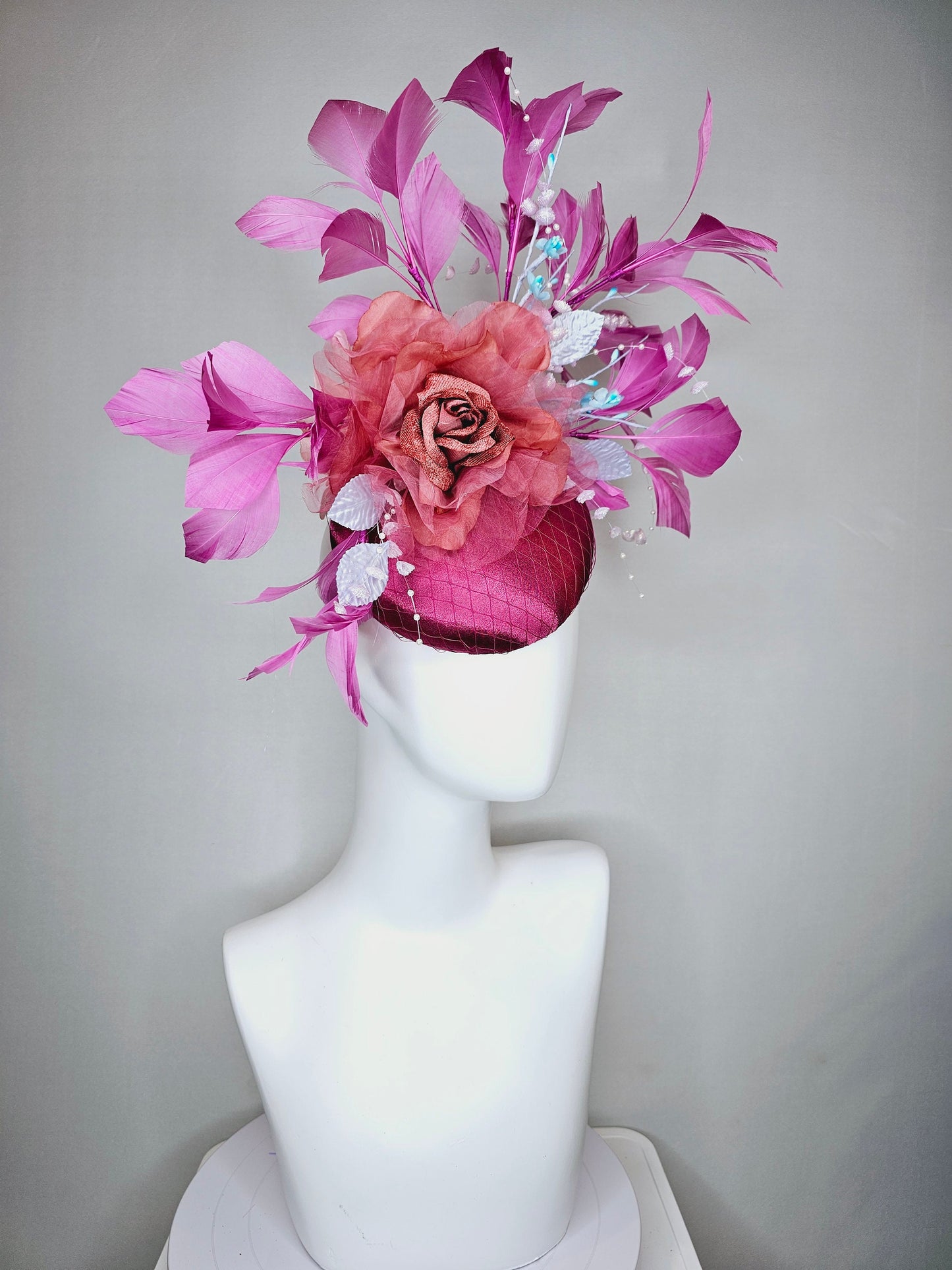 kentucky derby hat fascinator purple pink magenta satin with large burnt orange rust flower with purple lavender feathers light satin leaves