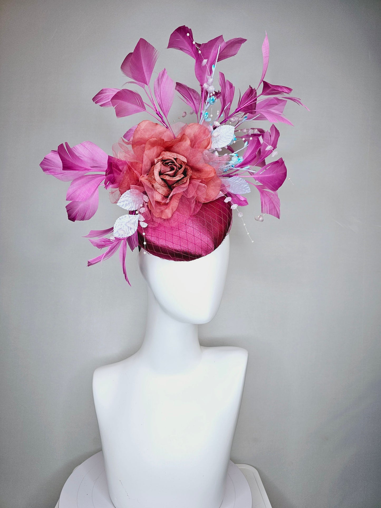 kentucky derby hat fascinator purple pink magenta satin with large burnt orange rust flower with purple lavender feathers light satin leaves