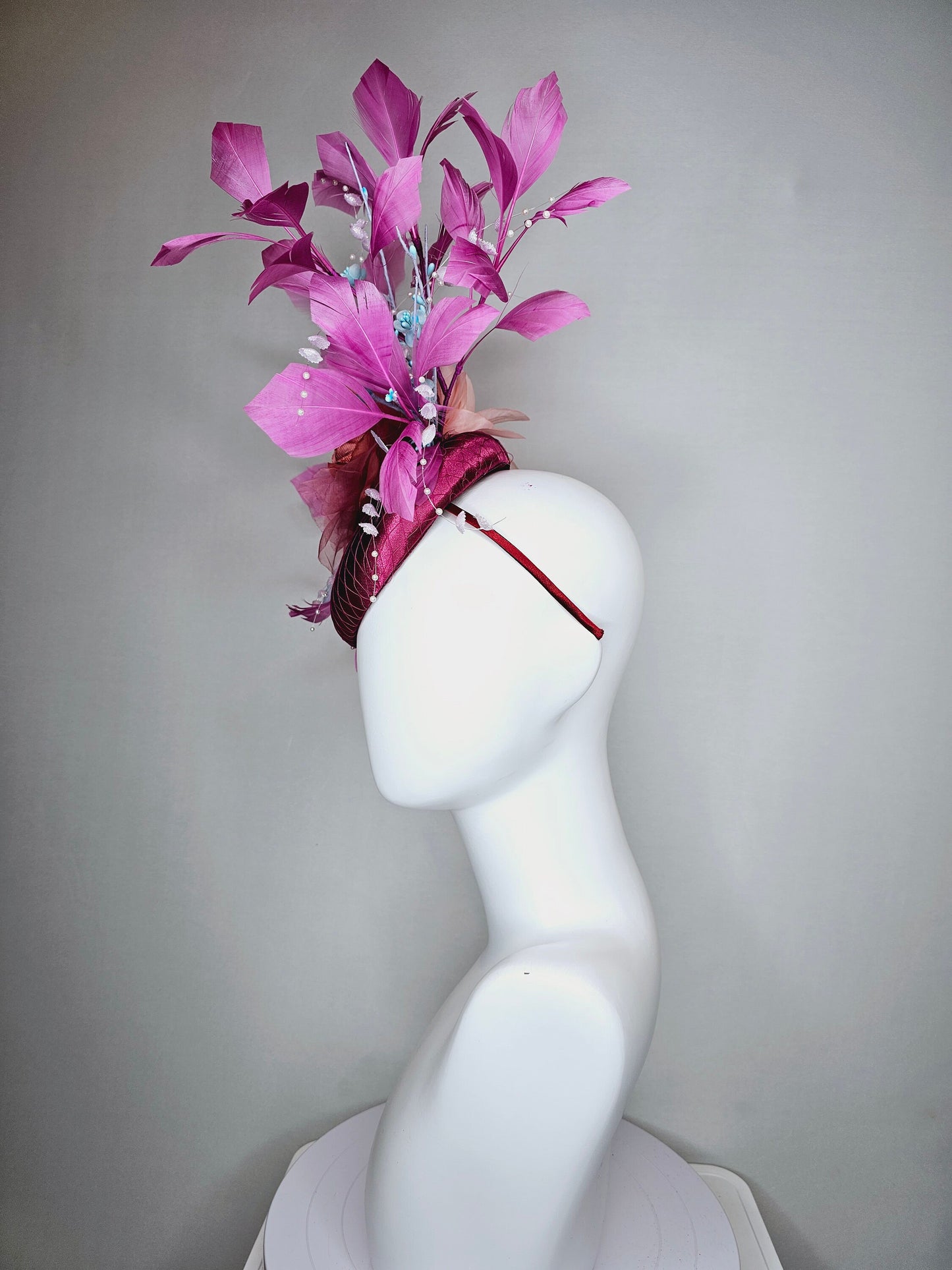 kentucky derby hat fascinator purple pink magenta satin with large burnt orange rust flower with purple lavender feathers light satin leaves