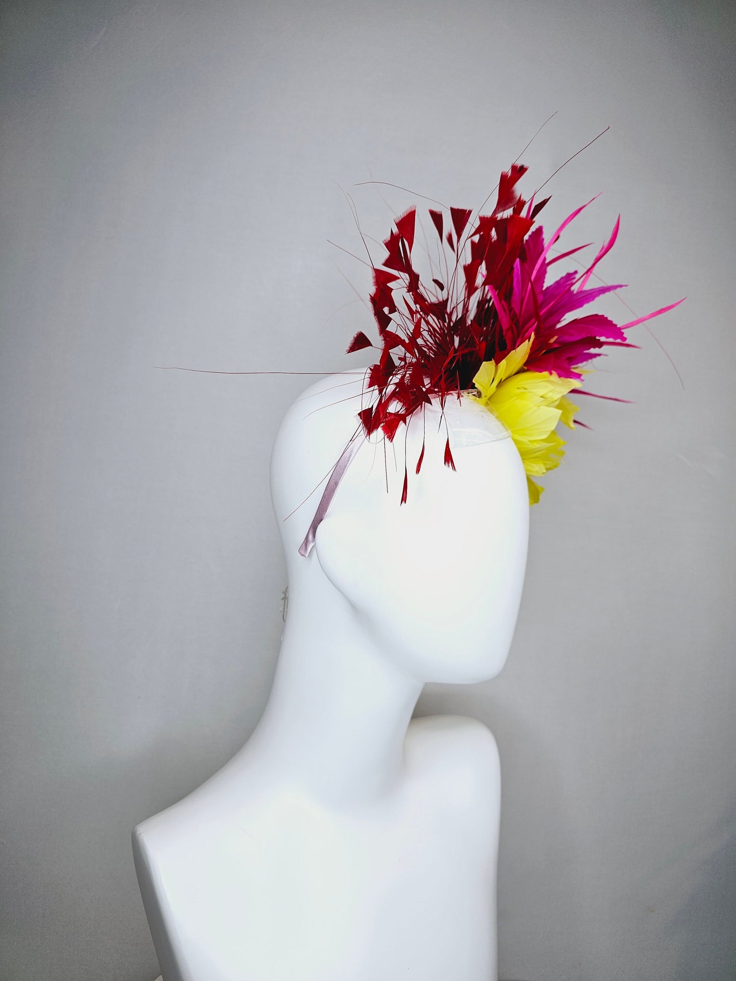 kentucky derby hat fascinator large yellow feather flowers with bright pink and red feathers thin headband