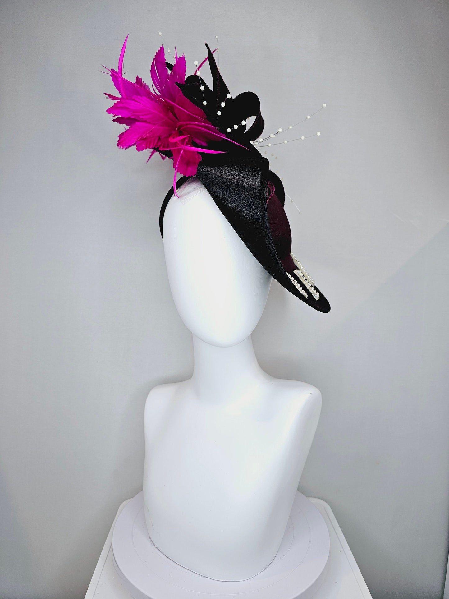 kentucky derby hat fascinator black satin saucer with airbrush pink and white letter decor pink feathers white pearls