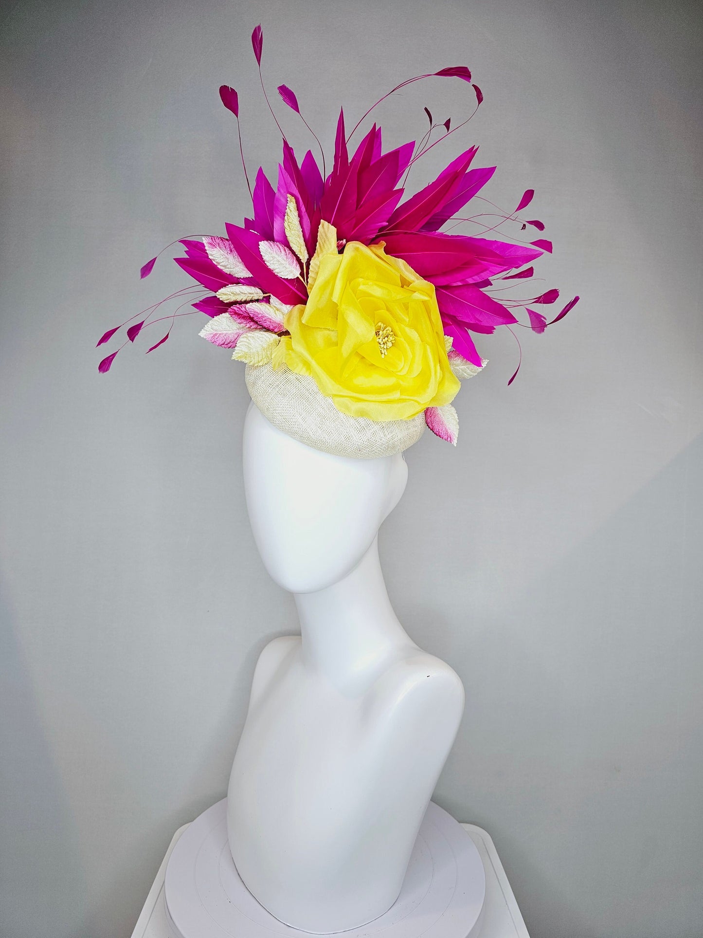 kentucky derby hat fascinator white sinamay pink and yellow leaves blush pink yellow silk flower and hot pink fuchsia feathers