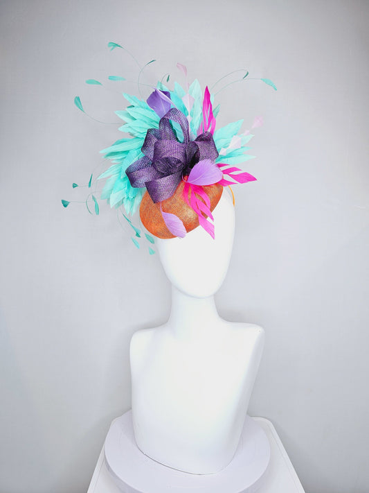 kentucky derby hat fascinator orange sinamay with mint green feathers with purple sinamay bow and hot pink  feather accent