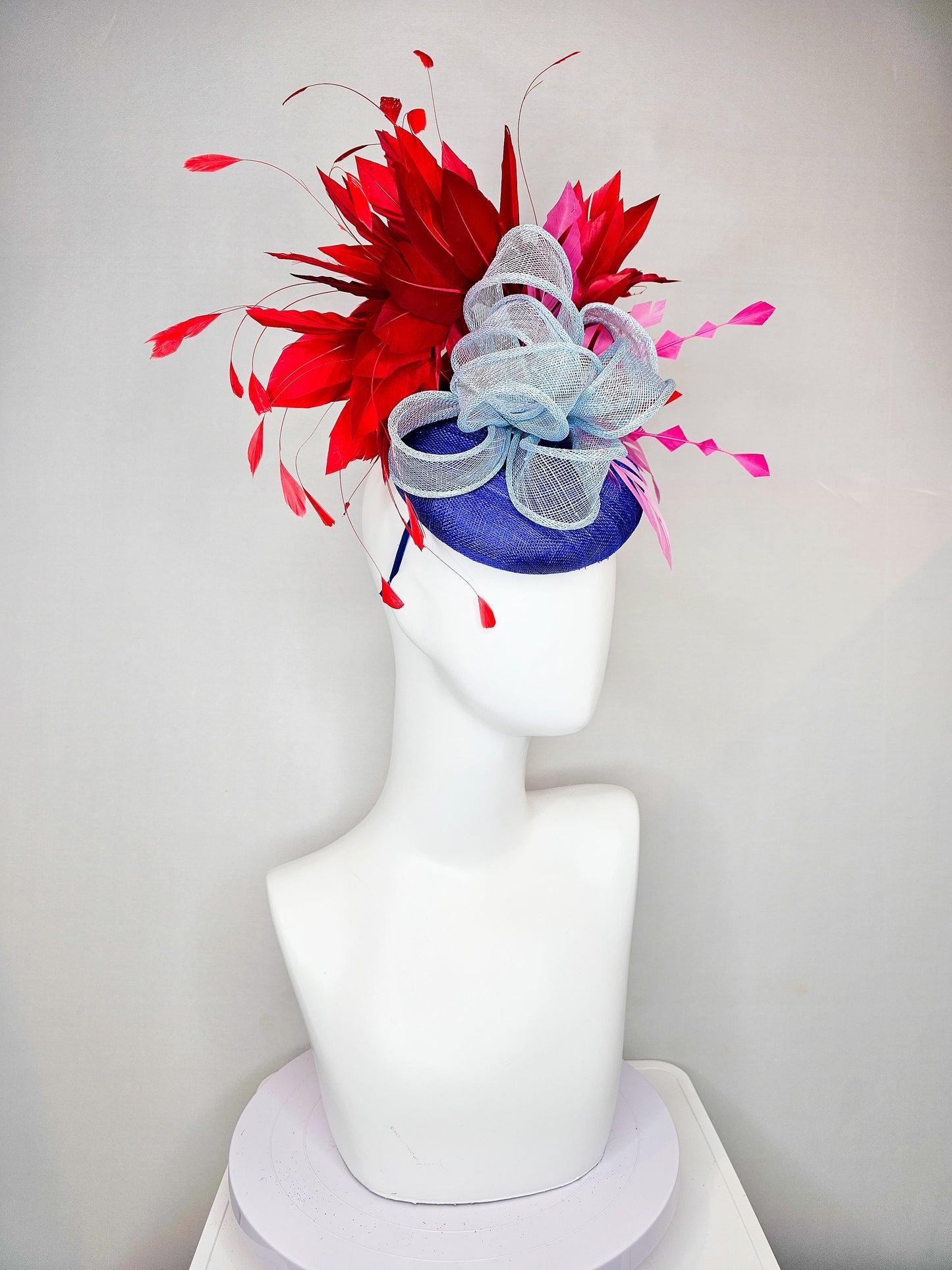 kentucky derby hat fascinator royal blue  sinamay with red feathers light blue sinamay bow and pink feather accent