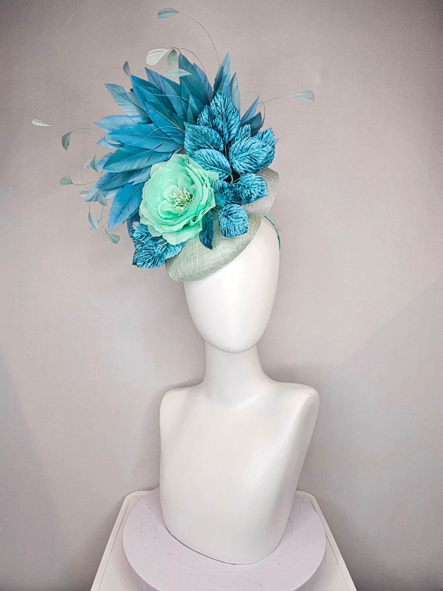 kentucky derby hat fascinator light ice blue green sinamay with mint green silk flower teal leaves teal green blue feathers