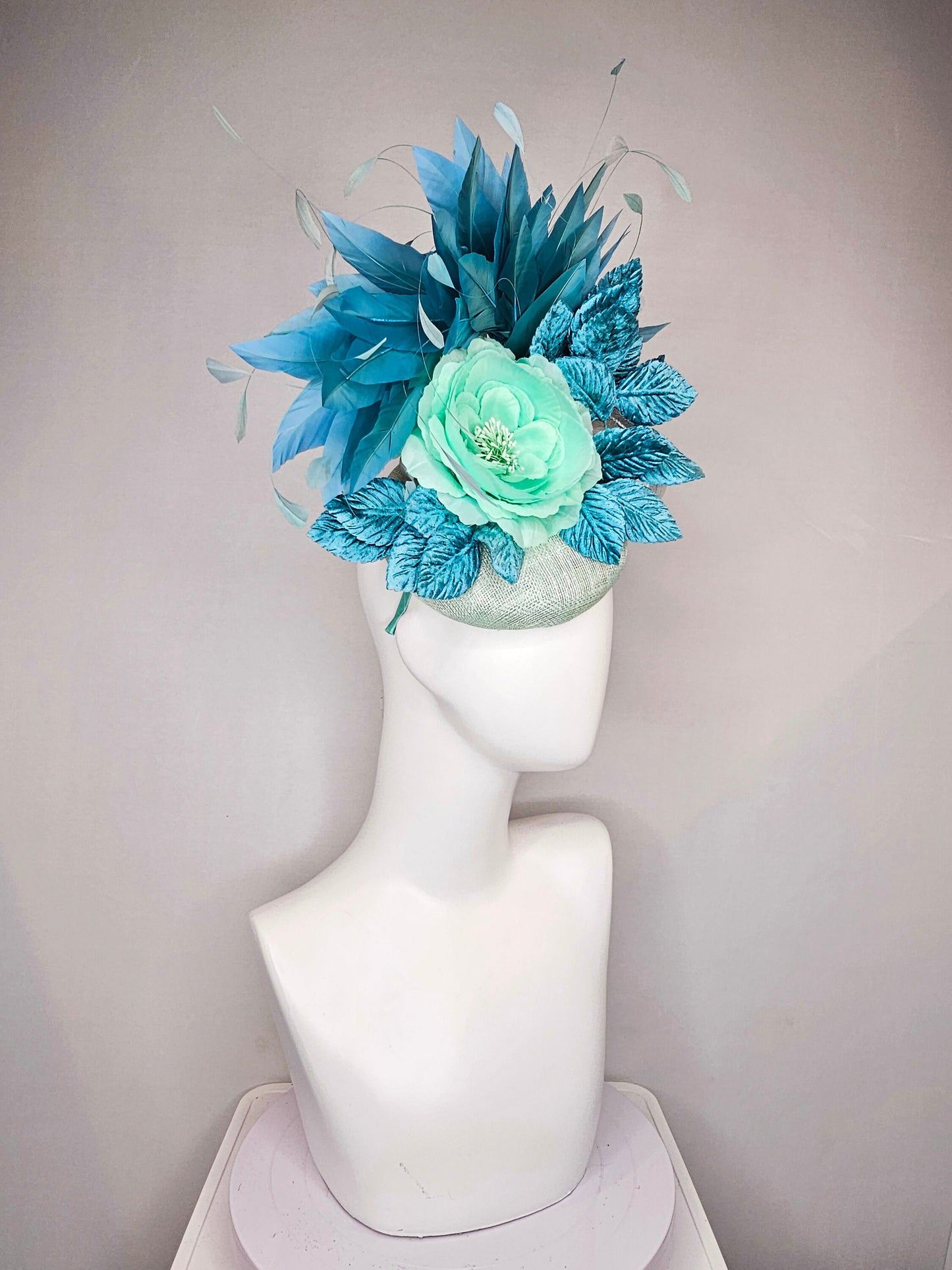 kentucky derby hat fascinator light ice blue green sinamay with mint green silk flower teal leaves teal green blue feathers