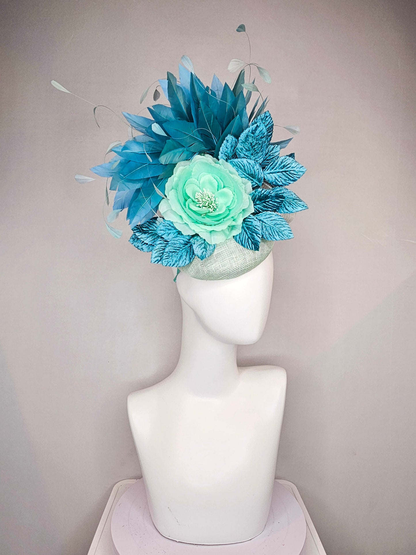 kentucky derby hat fascinator light ice blue green sinamay with mint green silk flower teal leaves teal green blue feathers