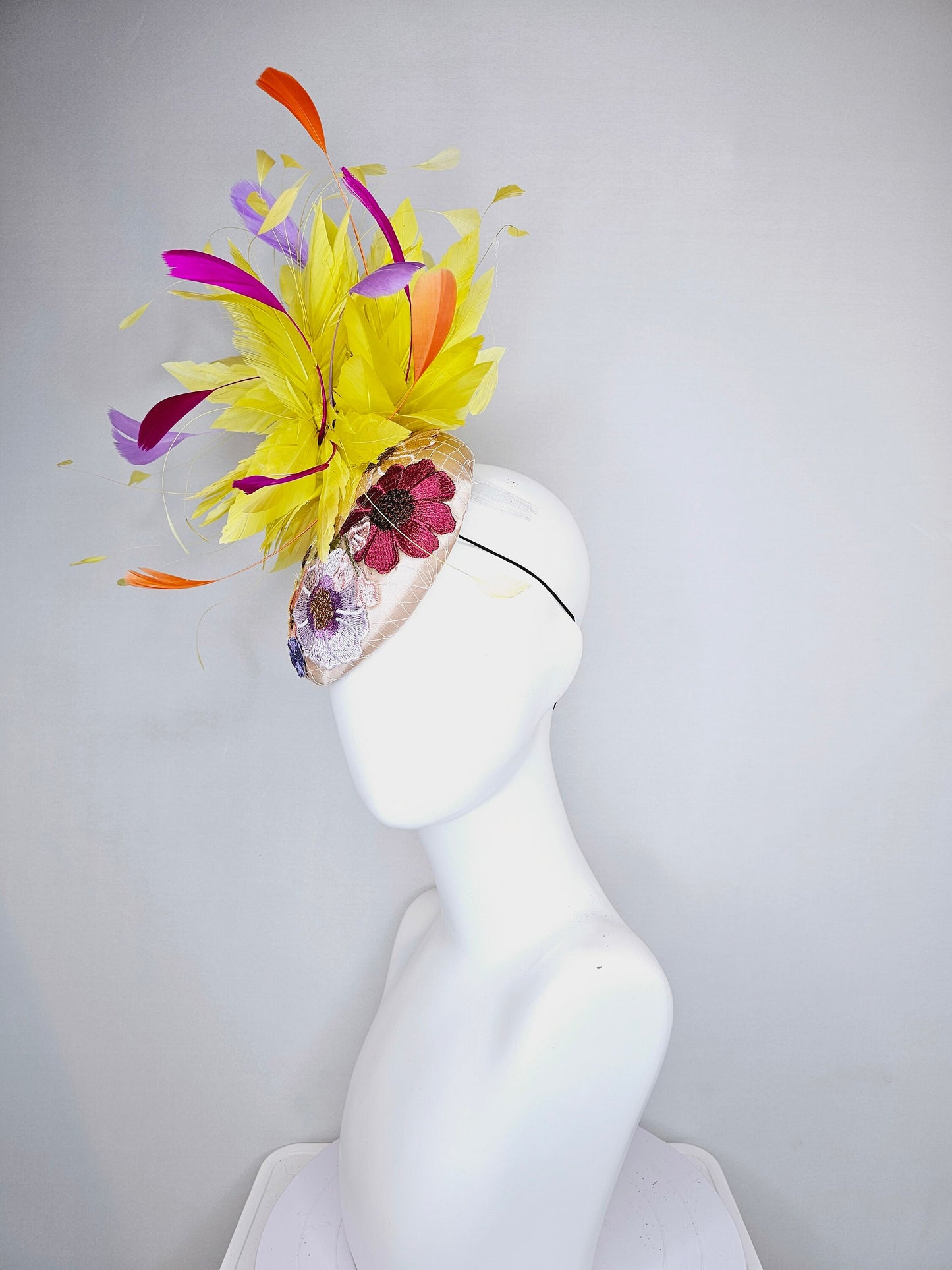 kentucky derby hat fascinator blush satin with embroidered colorful flowers with yellow feather pouf orange purple fuchsia pink feathers