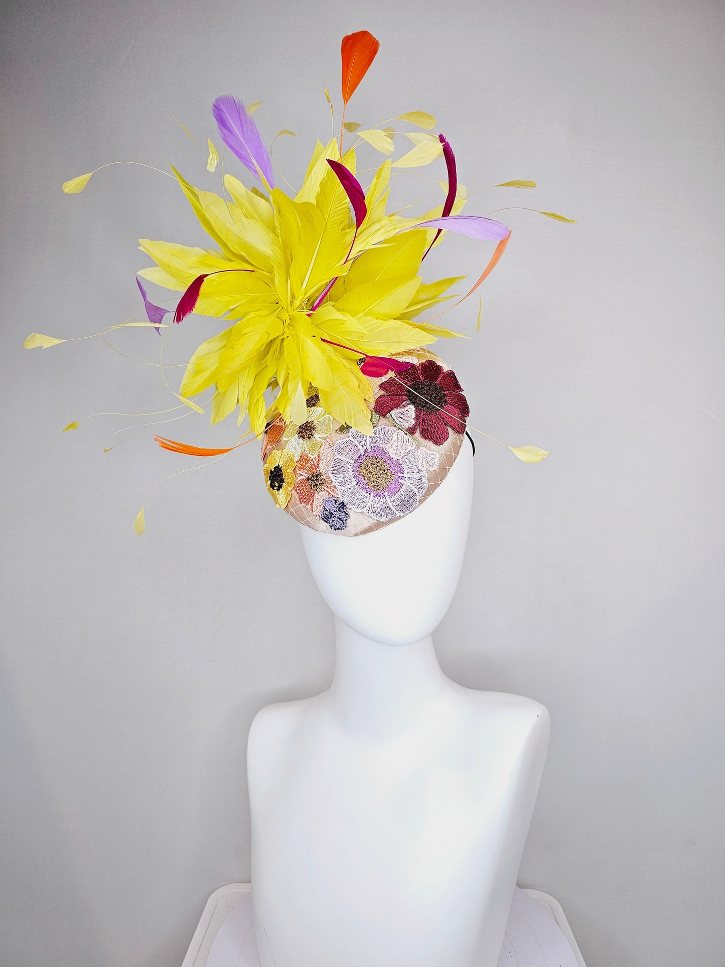 kentucky derby hat fascinator blush satin with embroidered colorful flowers with yellow feather pouf orange purple fuchsia pink feathers