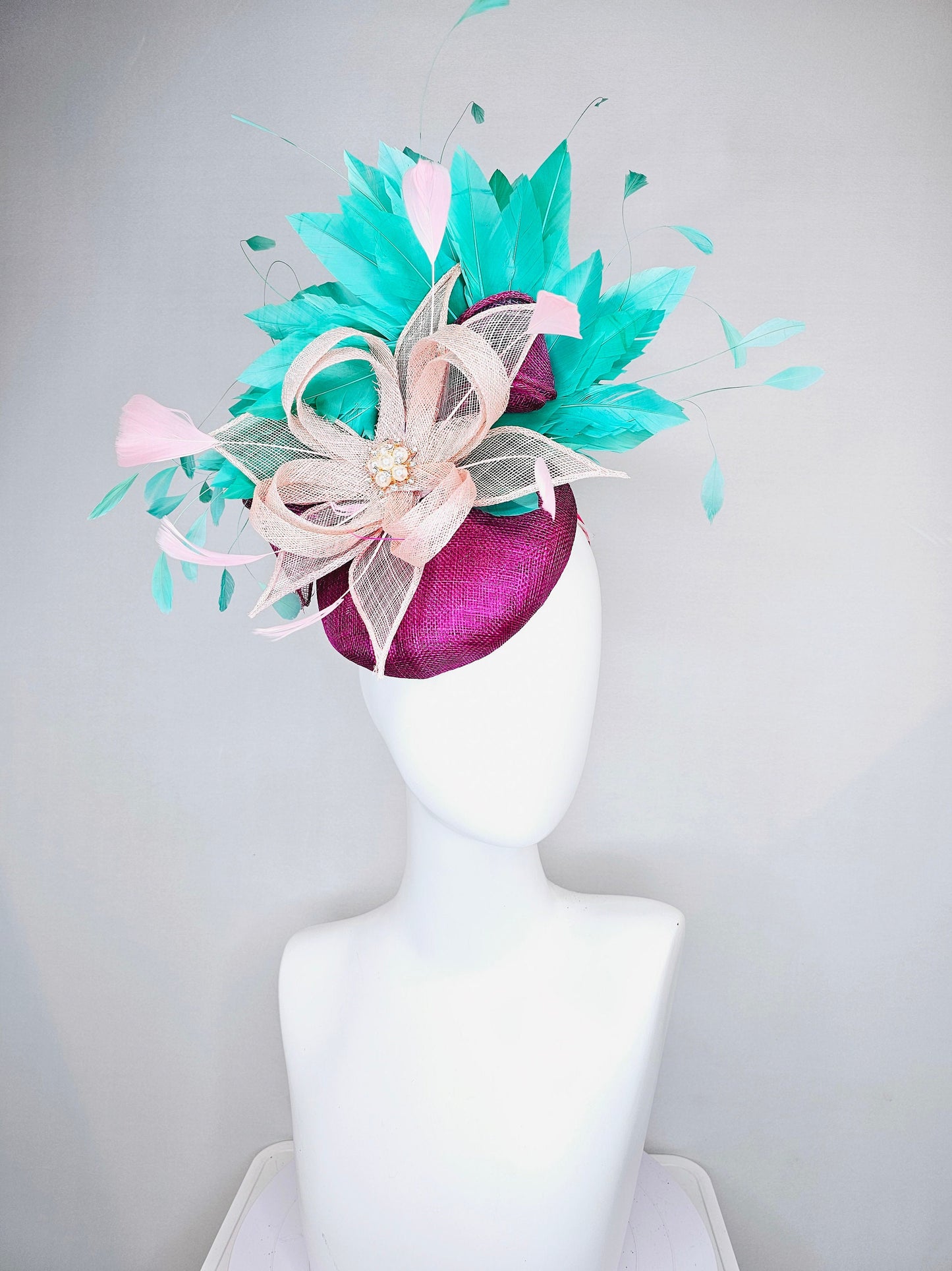 kentucky derby hat fascinator purple magenta sinmaay blush pink sinamay flower with pearls and bright green feathers