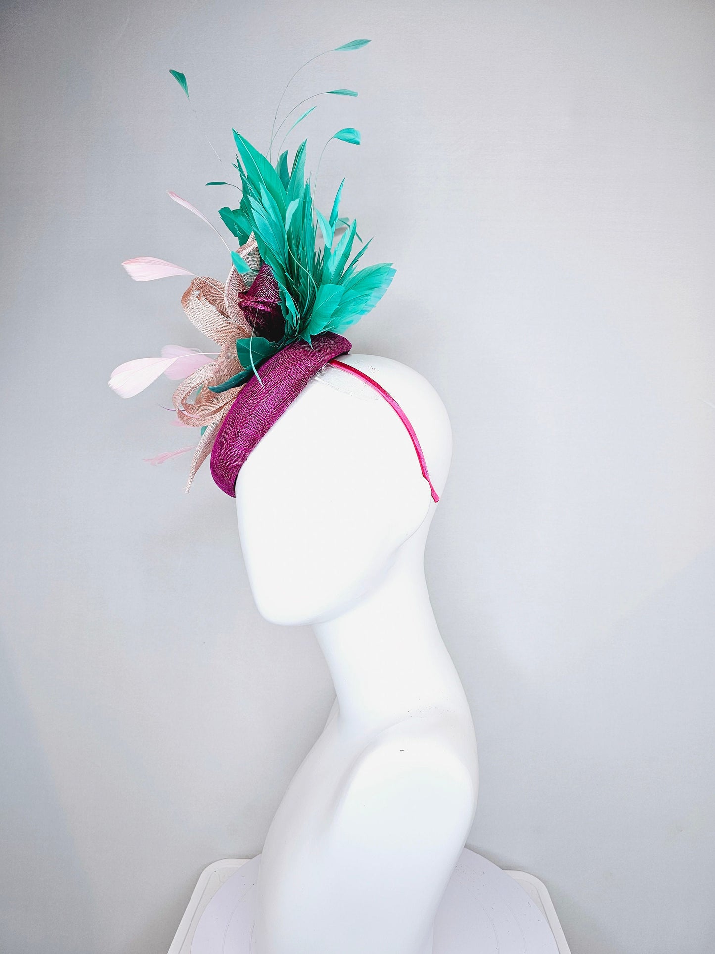 kentucky derby hat fascinator purple magenta sinmaay blush pink sinamay flower with pearls and bright green feathers