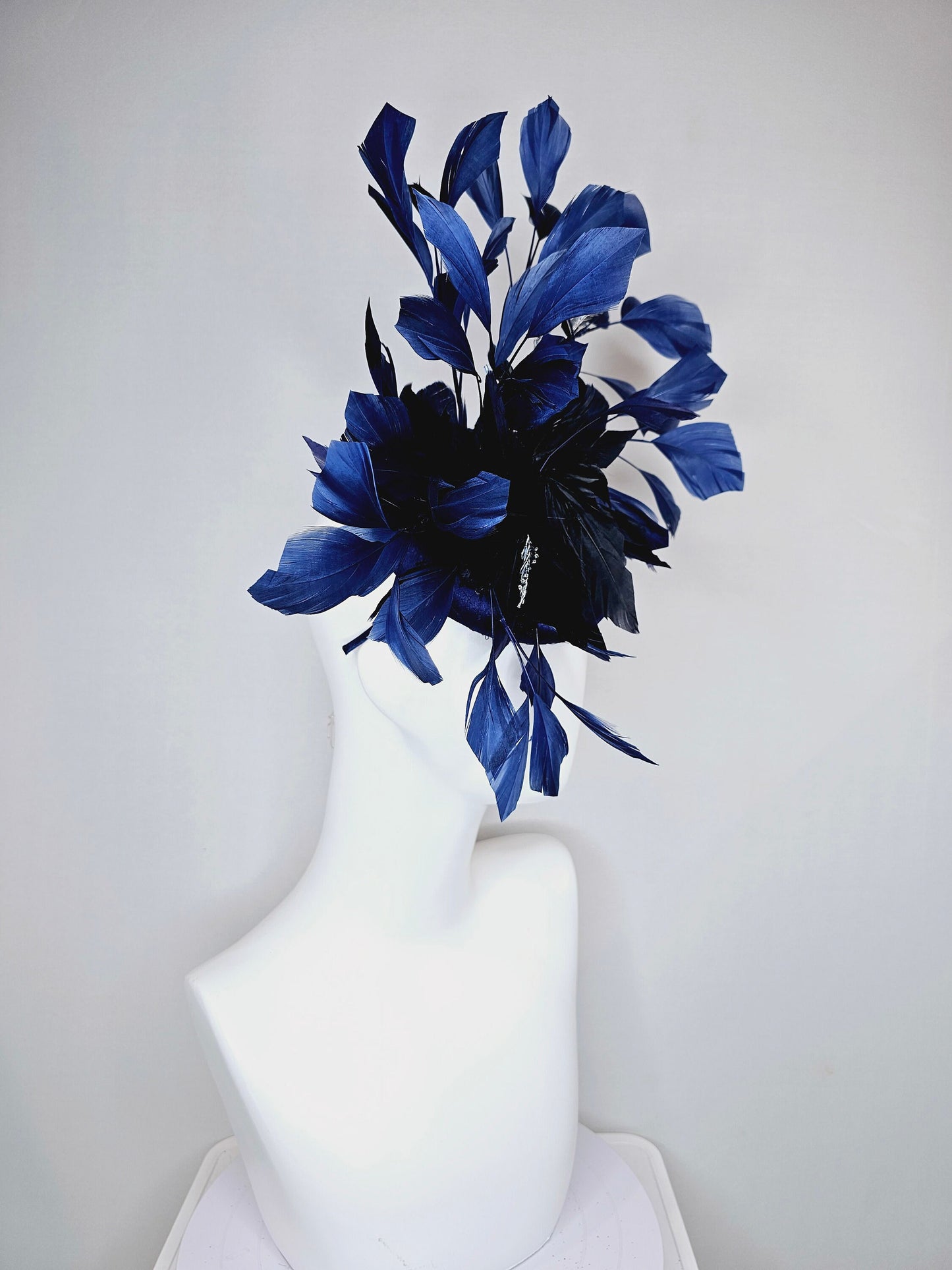 kentucky derby hat fascinator navy blue satin with embroidery with navy blue feathers and feather flower with branching silver beaded decor