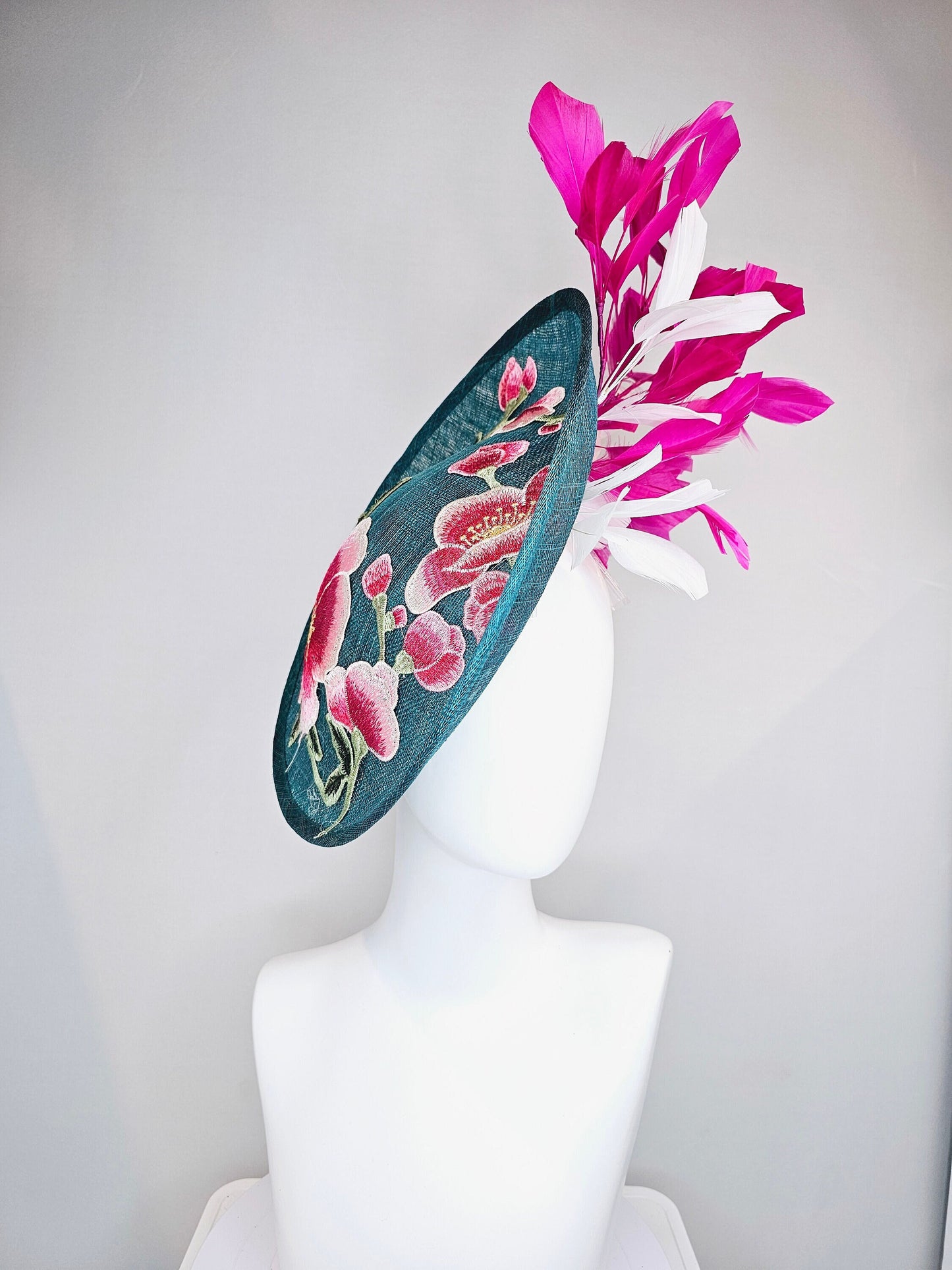 kentucky derby hat fascinator teal blue sinamay saucer with fuchsia pink and white feathers and pink white gold embroidered flowers