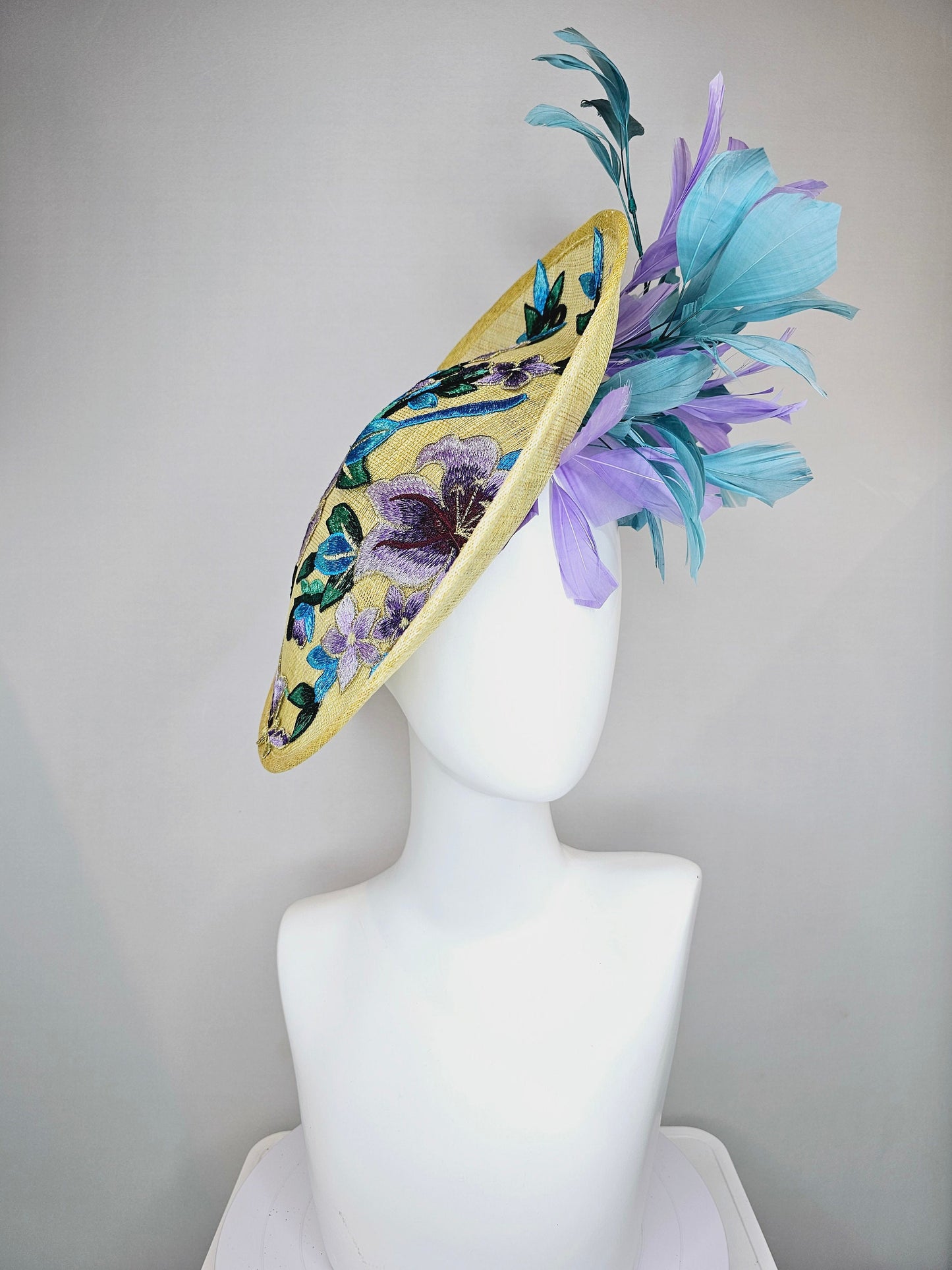 kentucky derby hat fascinator yellow sinamay saucer with blue violet purple feathers and blue lavender purple  gold embroidered flowers