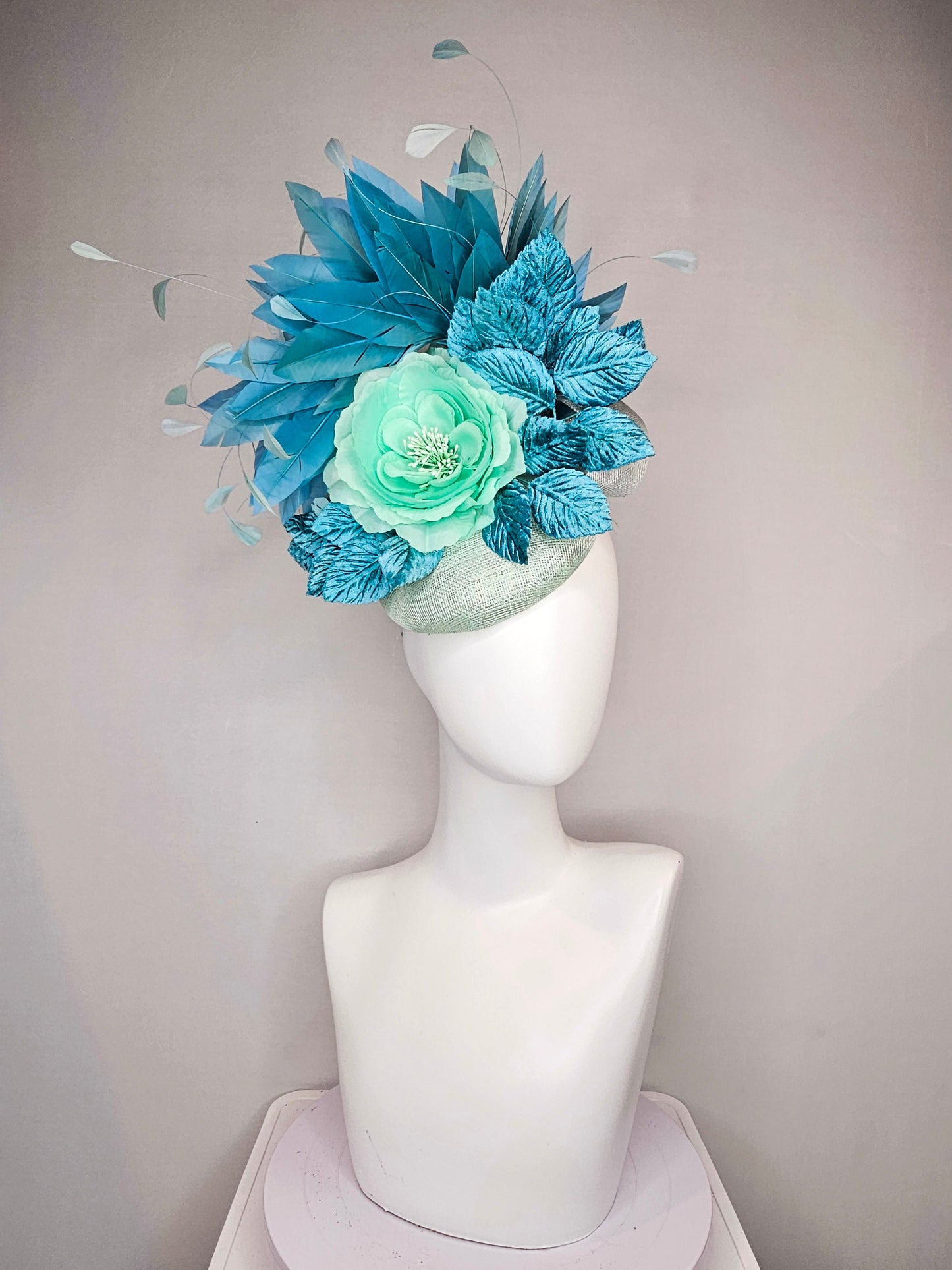 kentucky derby hat fascinator light ice blue green sinamay with mint green silk flower teal leaves teal green blue feathers