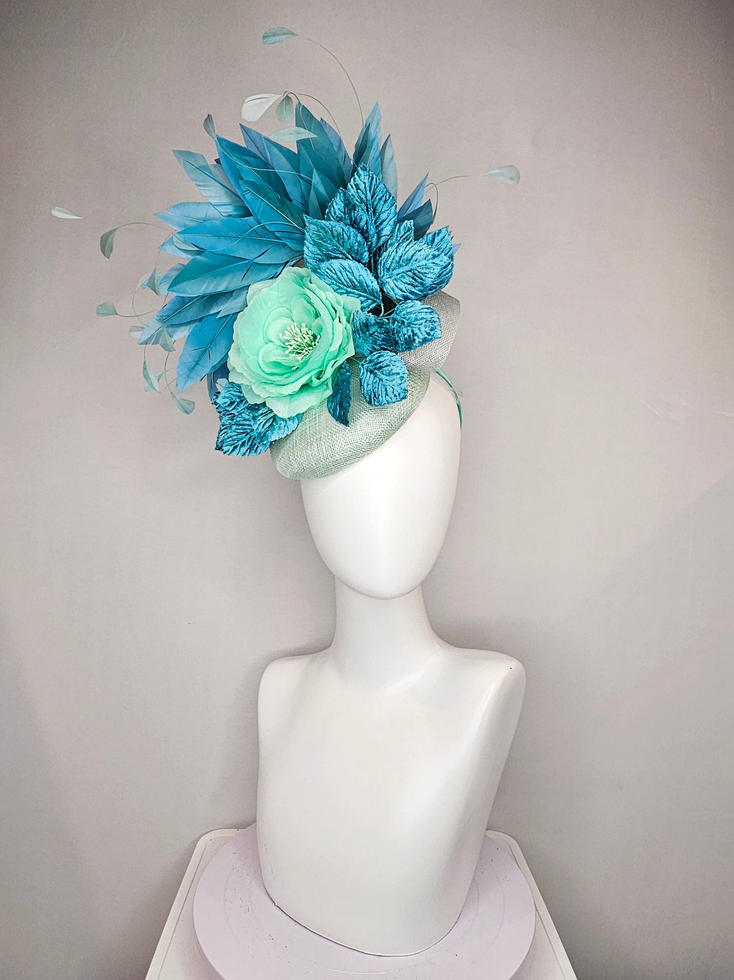 kentucky derby hat fascinator light ice blue green sinamay with mint green silk flower teal leaves teal green blue feathers