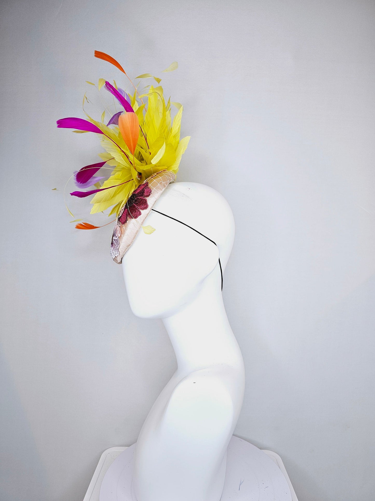 kentucky derby hat fascinator blush satin with embroidered colorful flowers with yellow feather pouf orange purple fuchsia pink feathers